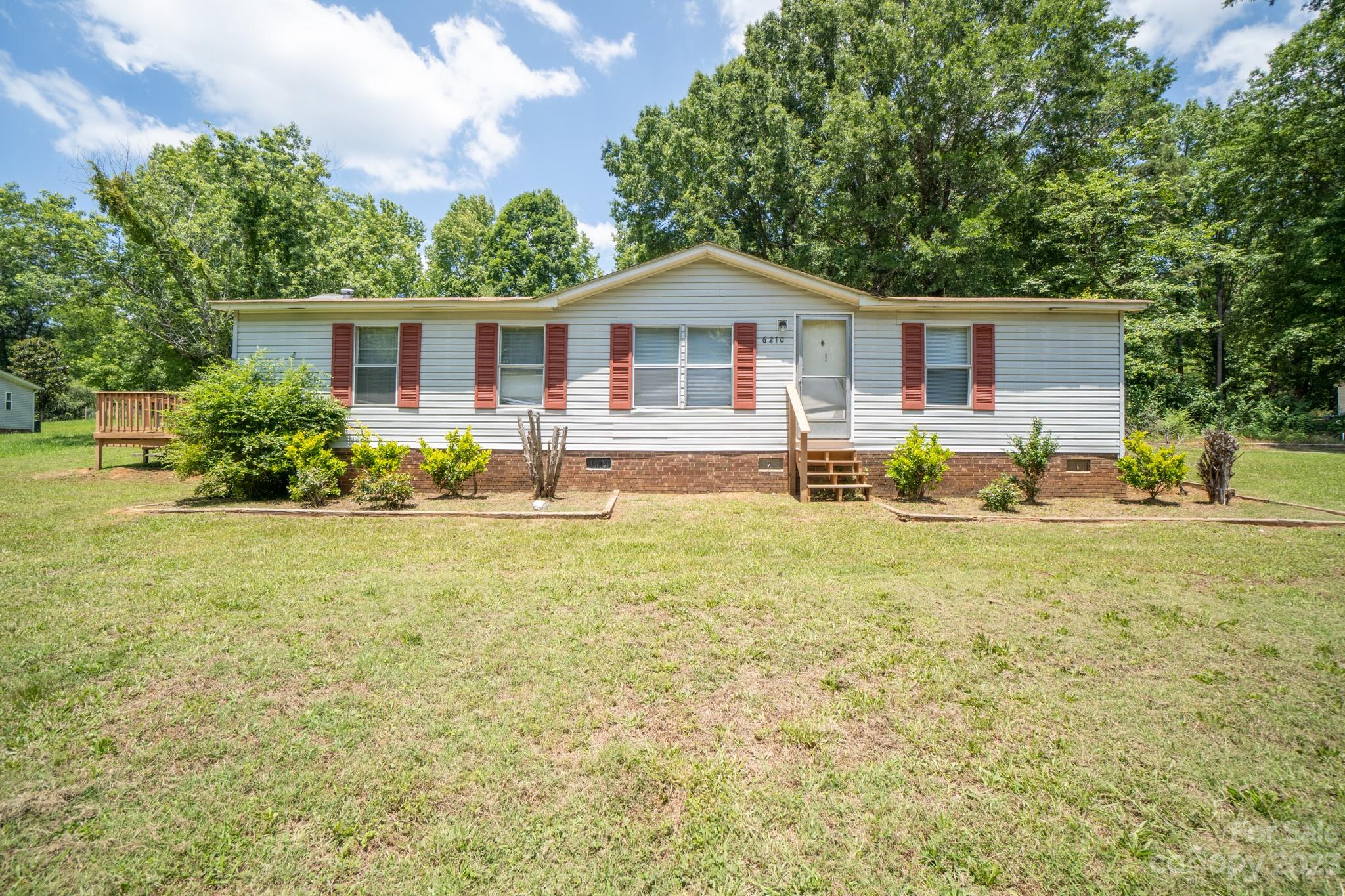 Single Family Manufactured home sits in a 2.18 Acres lot. 3 bed 2 bath home. Primary Bedroom has the attached bathroom. Nice deck at the back of the home to spend the time. Don't miss to see it. It is tenant occupied and please do not disturb the tenant.