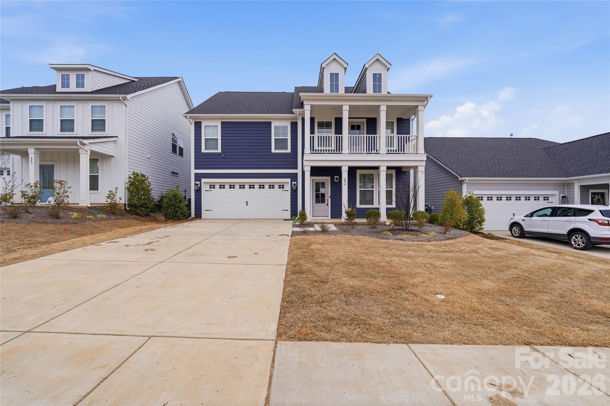 Stunning 4-bedroom, 3.5-bath home in the highly desirable Lake Wylie/Newport area of York, SC—offering the perfect combination of modern design, spacious living, and prime location just minutes from Charlotte. This beautifully crafted home features exceptional curb appeal with a welcoming covered front porch, striking exterior, and a spacious 2-car garage.
Step inside to a bright, open-concept layout filled with large windows that flood the home with natural light. The main level includes a dedicated office—ideal for remote work or a private study—along with an expansive living area that seamlessly connects to the chef-inspired kitchen. The kitchen showcases a large center island, abundant cabinetry, and clean, modern finishes—perfect for entertaining and everyday living.
Upstairs, enjoy generously sized secondary bedrooms and a truly impressive primary suite. The oversized primary bedroom offers plenty of space to relax, while the luxurious en-suite bath features dual vanities (his and hers), a large walk-in shower, and ample storage. Every bedroom is spacious and thoughtfully designed for comfort and flexibility.
The home also offers easy access to the backyard, ideal for outdoor living and entertaining.
Located just minutes from Lake Wylie, with convenient access to Highway 49, this home is close to shopping, dining, and everyday conveniences at Lake Wylie Plaza and Rivergate Shopping Center. Enjoy nearby parks, boating, and outdoor recreation, all while being a short drive to Uptown Charlotte.
This is an exceptional opportunity to own a move-in-ready home in one of the area’s fastest-growing and most desirable communities—schedule your private showing today!