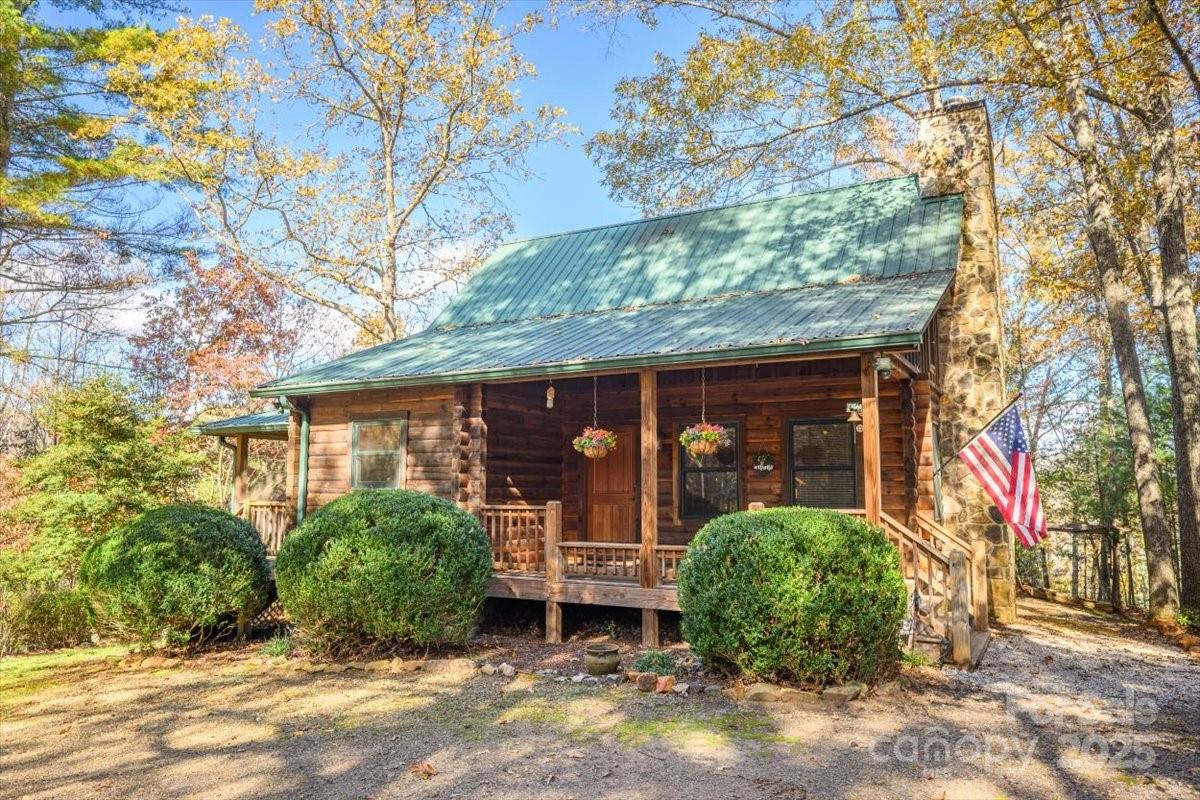 Discover peace & privacy at 87 Prater Cove Road. Nestled on approximately 7.78 wooded acres, this 2-bedroom, 2-bath cabin-style home with 2 story vaulted great room & wood-burning fireplace provides the perfect mountain retreat. Surrounded by mature trees & abundant wildlife, the property provides a true sense of seclusion while still being just a short drive from downtown Franklin's shopping, dining & local charm. Relax on the screened porch and take in the sights & sounds of nature, or explore the acreage for endless outdoor enjoyment. Located just about 12 miles from the Tennessee state line, this property offers easy access to scenic drives, hiking trails, and outdoor adventures in both states. Whether you’re looking for a full-time home, weekend getaway, or vacation rental opportunity, this inviting cabin captures the best of mountain living. Additional acreage may be available for purchase.