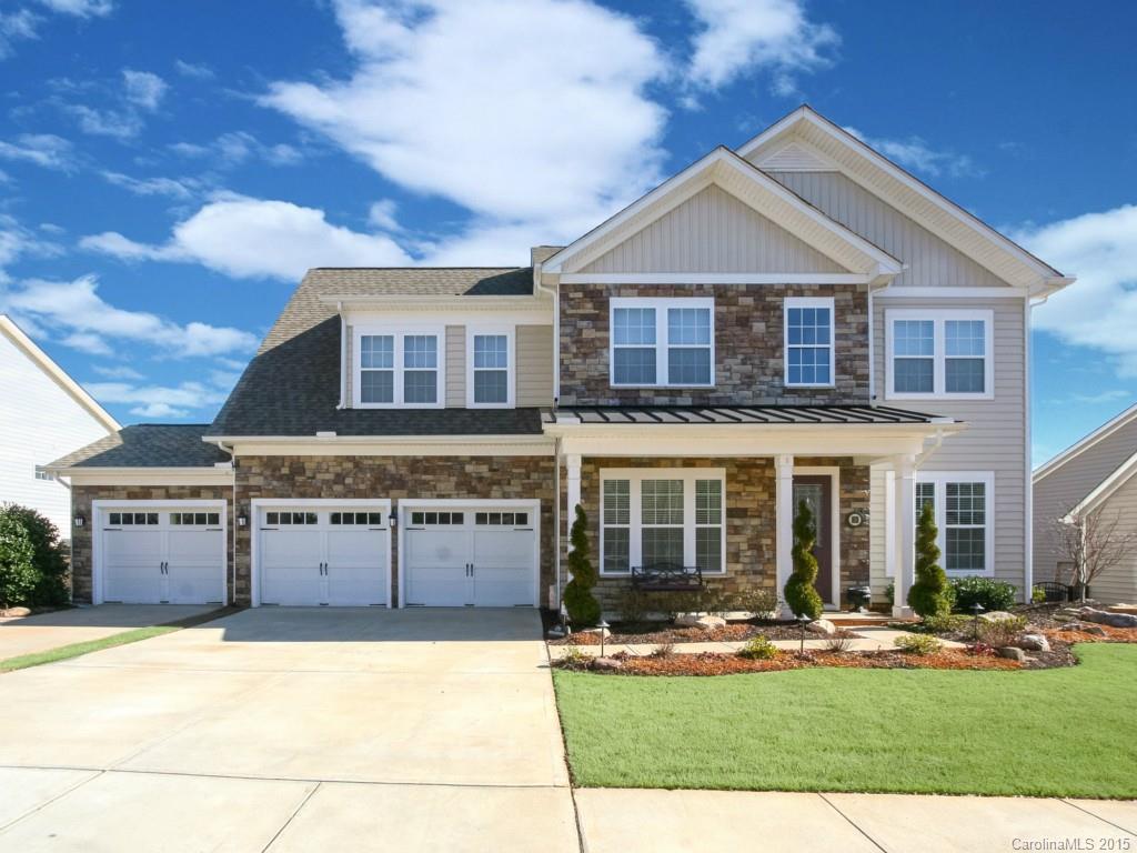 Gorgeous Stone Front Home w/3 Car Gar in Top Rated Fort Mill School District.Fantastic Outdoor Living w/Oversized Stone Paver Patio,Stone Firepit w/Tennessee Cap Stone Seating Wall,Blt-in Stone BBQ Grill w/ Double Burners.Fenced & Private Prof'l Landscaped Yard. Pristine Condition w/Gleaming HW Floors,High Ceilings, French Doors into 1st Flr Study.Chef's Delight Kitchen w/Granite,Gas Cooktop,Double Ovens,Pull Out Drawers. 1st Flr Guest BR.Huge MBR,Glamour Bath,Closet Organizers.