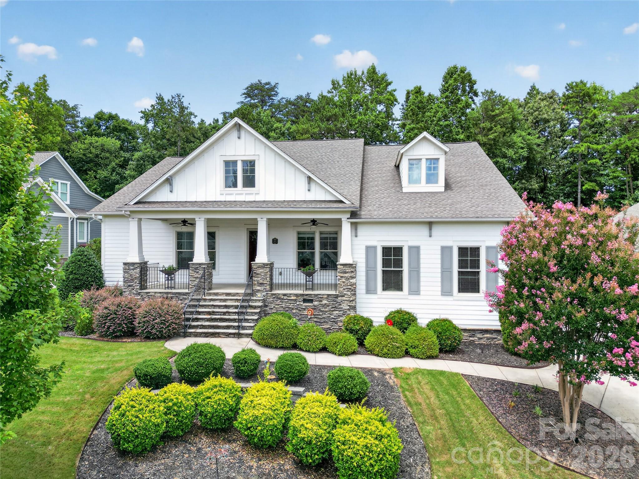 4 Bedrooms | 4.5 Bathrooms | Charleston-Style Ranch Home.
Welcome to 1133 Wessington Manor Lane, a beautifully updated Charleston-style ranch home ideally
situated in the highly sought-after Springfield community of Fort Mill. Offering an exceptional blend of
luxury, comfort, and resort-style amenities, this residence presents a rare opportunity to enjoy elevated
single-level living in one of the region's most desirable neighborhoods.
This elegant 4-bedroom, 4.5-bathroom home showcases an open-concept floor plan thoughtfully
designed for both everyday living and effortless entertaining. A spacious upstairs media room offers
exceptional versatility—perfect as a movie or game room, a private home office, or a personal fitness
studio. From the inviting front veranda to the stunning covered rear porch overlooking the Springfield
Golf Course, every detail of this home has been curated with distinction.
The heart of the home is a spectacular chef's kitchen, featuring a massive center island, abundant
cabinetry, and a walk-in pantry. Extensive recent updates include new kitchen cabinetry, new quartz
countertops across the island, perimeter counters, and bar, a new designer backsplash, and additional
built-in island storage. The kitchen is outfitted with premium appliances, including a Wolf induction
cooktop, a BEST high-powered downdraft vent, a new refrigerator, a new dishwasher, and a new
wine cooler in the adjoining bar area.

RECENT WHOLE-HOME IMPROVEMENTS - • Fresh interior paint throughout
• Brand-new flooring throughout the entire home
• Newly updated natural stone fireplace feature wall
• New motorized blinds in the living and dining rooms
• Fresh paint on crown molding and baseboards
• Fresh paint on bathroom cabinetry
• Additional cabinetry added to the laundry room for extra storage

The luxurious primary suite features soaring vaulted ceilings, while each thoughtfully designed
secondary bedroom offers exceptional comfort and privacy. The spacious covered back porch,
complete with its own fireplace, creates an incredible outdoor living space overlooking the fairways of
the Springfield Golf Course—an idyllic setting for relaxing evenings or entertaining guests.

ADDITIONAL PREMIUM FEATURES: 
• 10ft high ceilings
• Sonos whole-home audio system with speakers in the family room, dining area, media room,
primary bedroom, and covered patio
• Sprinkler irrigation system
• Outdoor landscape lighting
• Two HVAC systems (installed 2019 and 2013)

Living in Springfield means enjoying one of Fort Mill's premier lifestyle communities. Residents enjoy
access to a wealth of resort-style amenities, including:
• Championship golf course
• Lighted tennis courts
• Lighted pickleball courts
• Resort-style swimming pool with water slides
• Fitness center
• Children's playground
• Indoor and outdoor event spaces
• Scenic walking trails throughout the neighborhood

The location is equally exceptional. The home is within walking distance of the highly rated Nation
Ford High School and the historic Anne Springs Close Greenway Farmhouse. Everyday
conveniences—including Harris Teeter, CVS, Walgreens, the YMCA, Atrium Health Urgent Care,
restaurants, and gas stations—are all just five to seven minutes away.
This beautifully renovated home combines timeless Charleston charm with modern luxury, premium
upgrades, and an unmatched resort-style lifestyle in one of Fort Mill's most desirable communities.
Dont miss the opportunity to make this exceptional property your next home.