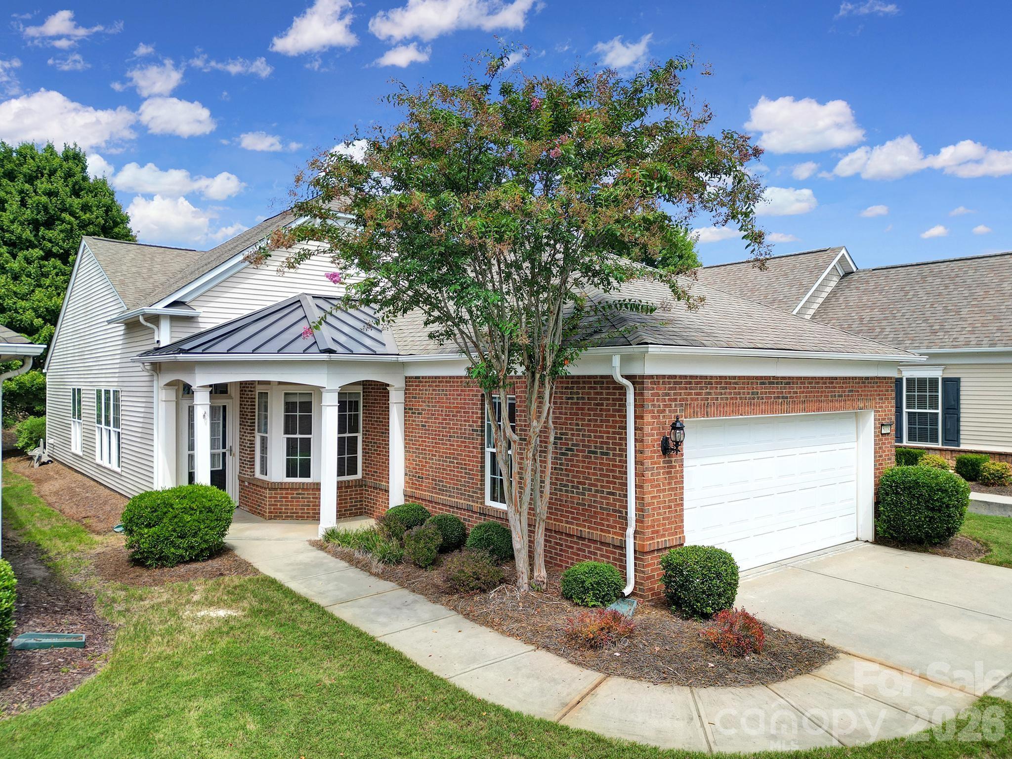 Step into easy living with this charming move in ready ranch-style home, perfectly located towards the front of one of the area’s most desirable active adult communities being Sun City Carolina Lakes. Designed with comfort and convenience in mind, this residence features brand-new carpet and fresh paint throughout, creating a soft and welcoming feel in every room. The single-level layout makes everyday living effortless, while open and airy spaces are ideal for both relaxation and entertaining. The kitchen flows seamlessly into the sunroom and living areas, allowing you to enjoy time with company in one inviting space. Generously sized bedrooms provide comfort and privacy, while large windows bathe the home in natural light. A private extended patio and landscaped backyard area offers the perfect spot to enjoy your morning coffee or unwind in the evenings. Beyond the home itself, the community is what truly sets this property apart. Residents enjoy access to a wide array of amenities, from swimming pools and fitness centers to tennis and pickleball courts, walking trails, and a beautifully appointed clubhouse. Dozens of clubs and social activities ensure there’s always something to enjoy—whether it’s arts and crafts, travel groups, or game nights with friends. Adding to its appeal, this home is ideally situated near shopping, dining, and medical facilities, giving you everything you need within minutes of your front door. With its fresh updates, resort-style amenities, and unbeatable location, this home offers the perfect combination of comfort, community, and convenience.
