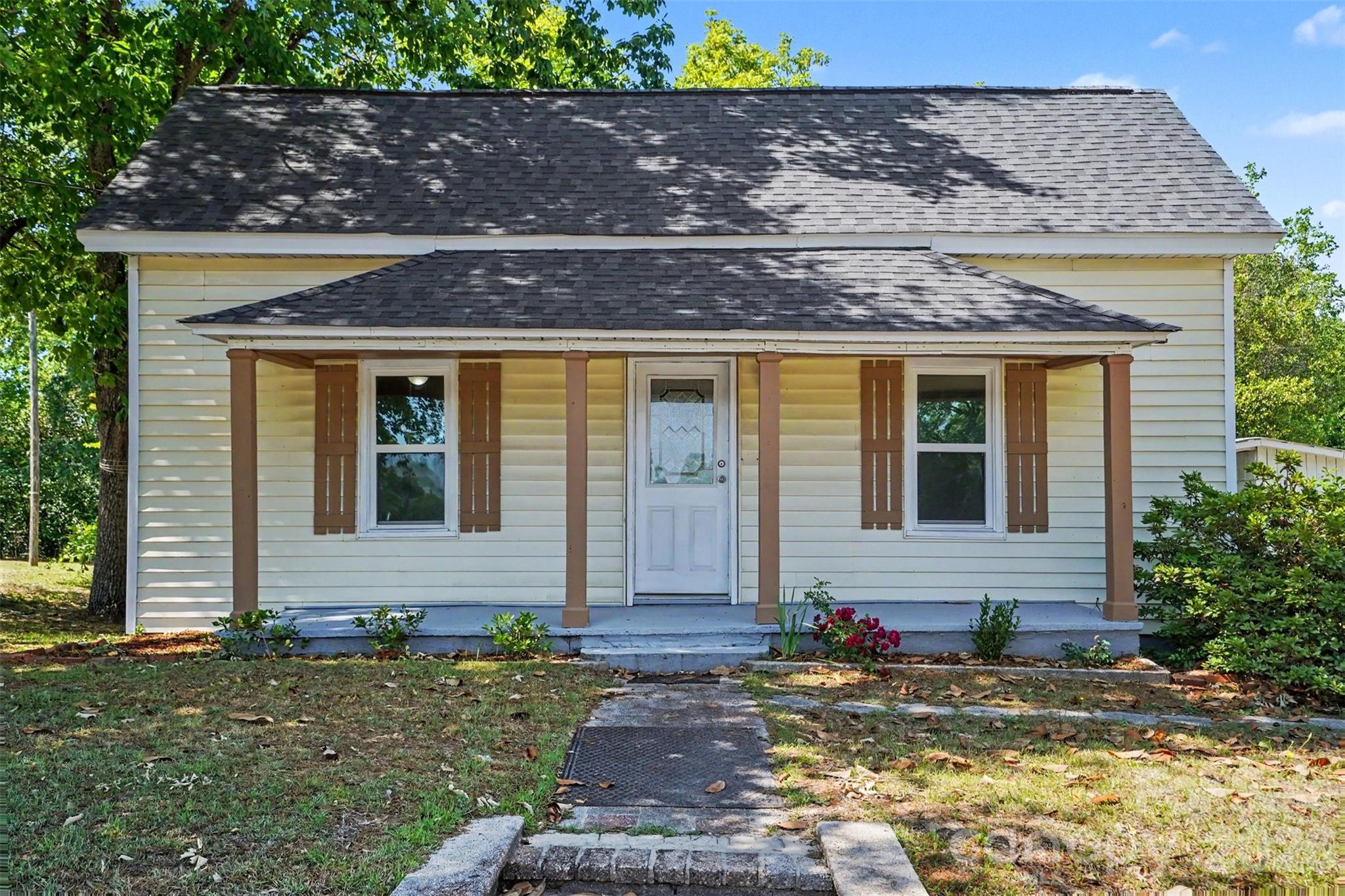 Location, location, location! Whether you're a first-time homebuyer, investor looking for your next rental or need a space for a commercial business this one checks all the boxes.

Walk to restaurants, shops, and grocery stores—convenience at its best! Major updates already done for you, including a new roof, newer HVAC, windows, and water heater. Inside, you’ll love the fresh paint, new vinyl flooring, plush new carpet, and sleek stainless steel appliances.

Priced to move quickly—don’t miss your chance. Sold AS-IS!