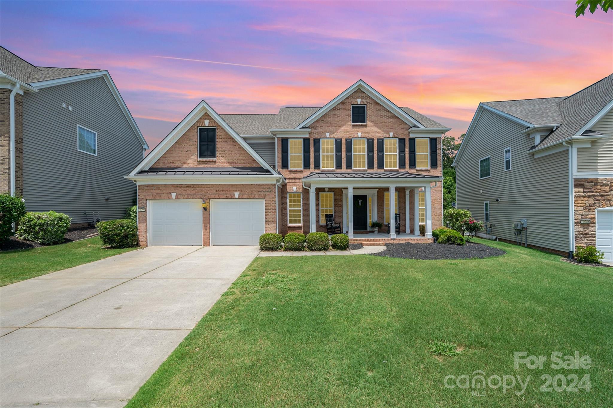 Beautiful move-in ready 5BR/3BA in highly sought after Villages at Skybrook North! Main level guest room with ensuite bath.  Outdoor living spaces galore! Large, private lot backing to woods and creek with huge custom flagstone patio. Covered "rocking chair" front porch. All new LVP floors throughout 1st floor. Large cherry kitchen w/island, granite, stainless steel appliances, gas range, microwave, tile backsplash, desk & walk-in pantry. Perfect for entertaining! FR w/gas fireplace. Formal living room could be used as a study. Formal dining w/butlers pantry, tray ceiling & wainscoting. Upper level  suite primary suite w/coffee bar, tray ceiling, his/hers walk-in closets, oversized shower & tub, dual vanities & tile floors. Two-story foyer. Main level laundry. Bonus room. New roof!  Tons of storage. Faces WEST! Cox Mill High School!  Must see!