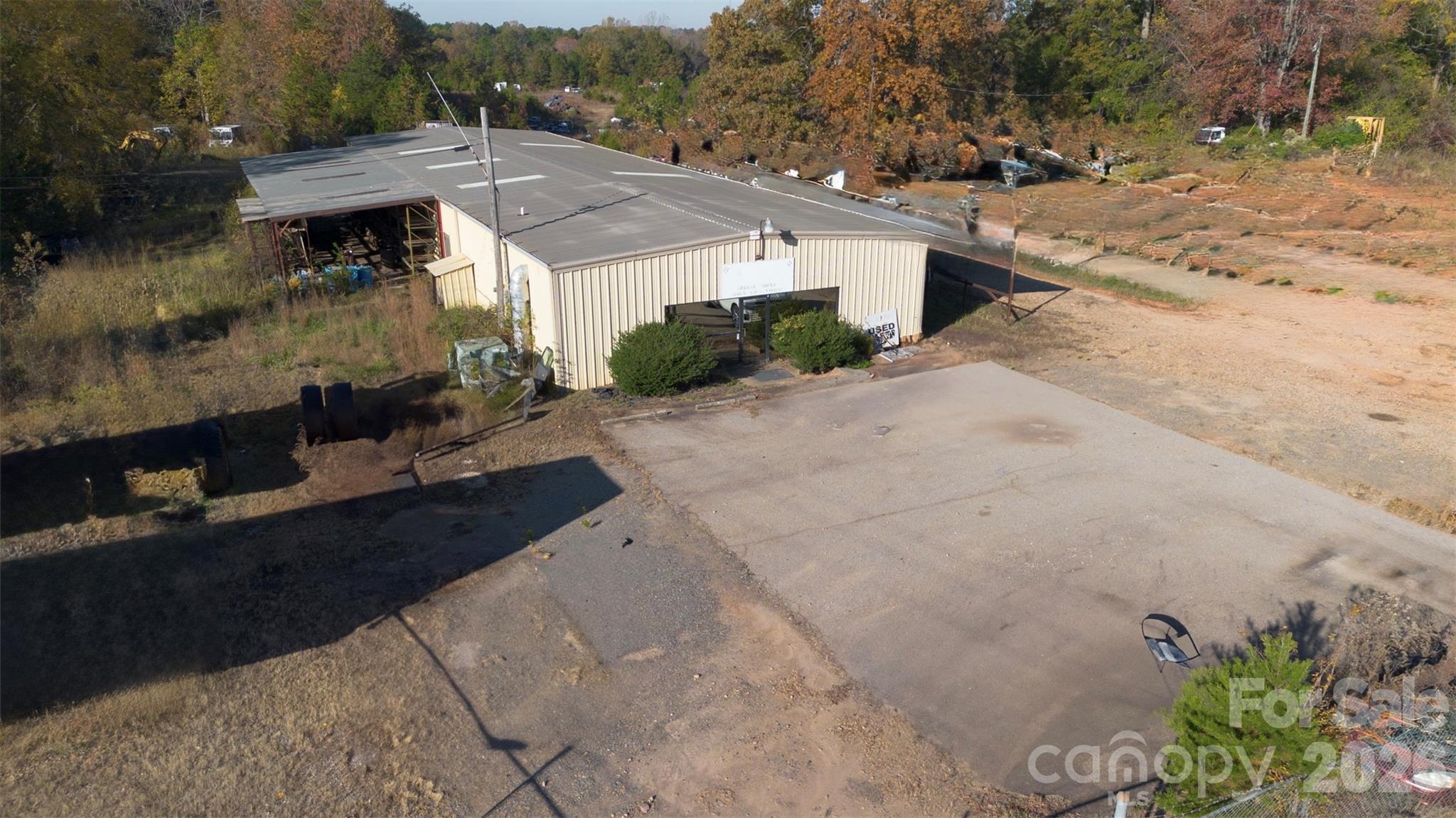 Acreage like this (15 acres) with an existing warehouse building is increasingly rare in this market. The four 12’ high bay doors provide practical access for trucks, service fleets or industrial tenants. High-visibility frontage on Red River Road delivers excellent branding opportunity for a business or future tenant. Flexibility to convert or expand: the land allows for yard expansion, outdoor storage, or secondary buildings if needed. Strong long-term hold: whether you occupy, lease out, or redevelop, this asset provides multiple exit strategies.