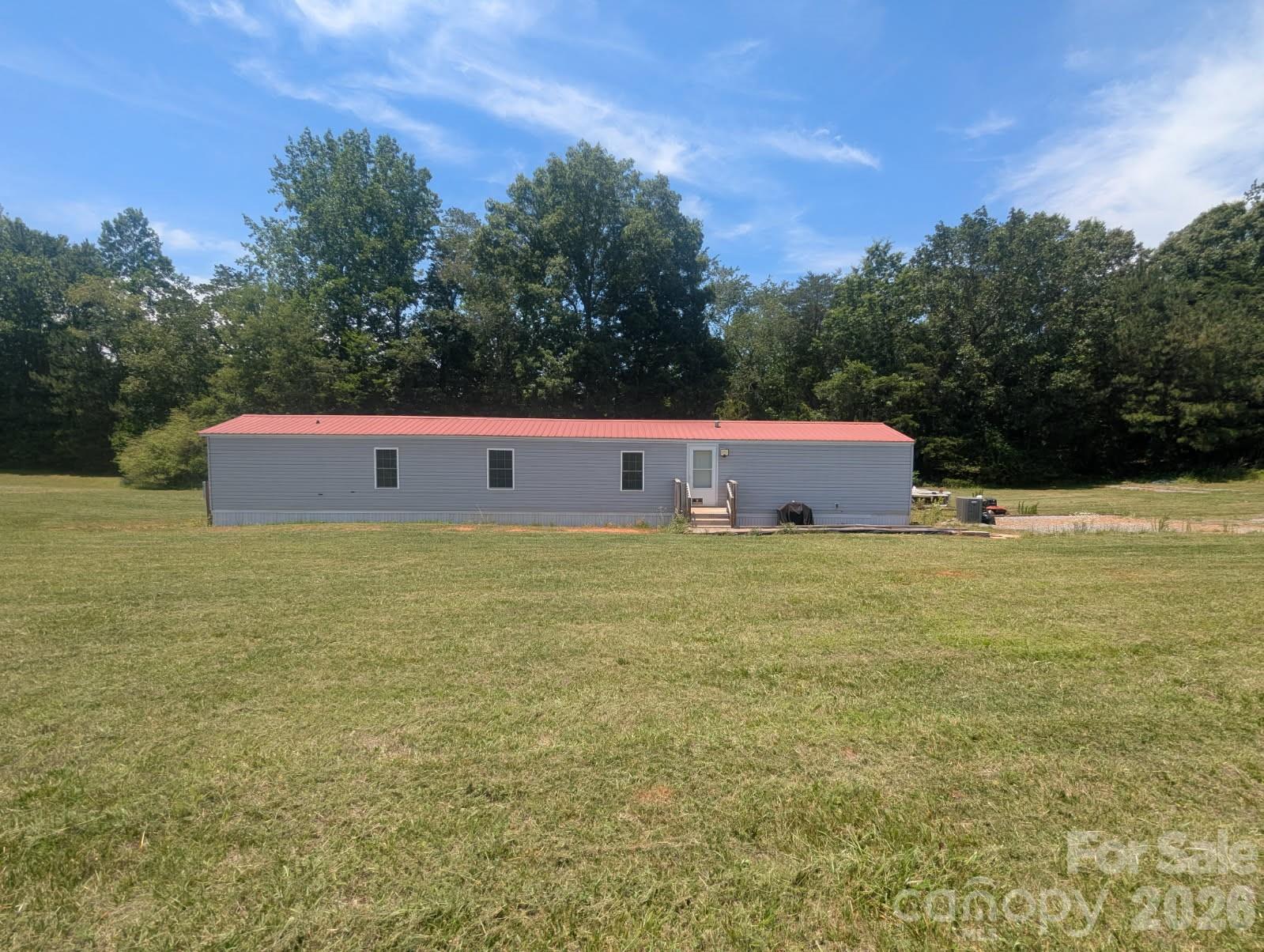 Opportunity Awaits!!  a 2012 Singlewide Mobile Home on 1.25 Acre Lot in Polk County - Located in Deer Meadows subdivision, just off of Pea Ridge Rd. - In A Great Location, just minutes to TIEC, local towns, HWY 74, I-26, & more!  Home is incomplete and won't qualify for certain financing - looking for investors or cash buyers!  Home has 3 bedrooms, 2 full bathrooms, a carport, and sits over 300 feet off of the road!  Home still needs appliances, sheet-rock, the HVAC system connected, and various electrical items corrected or completed.  Home is Sold As-Is / Sellers will not do any repairs. Appointment Only to view.