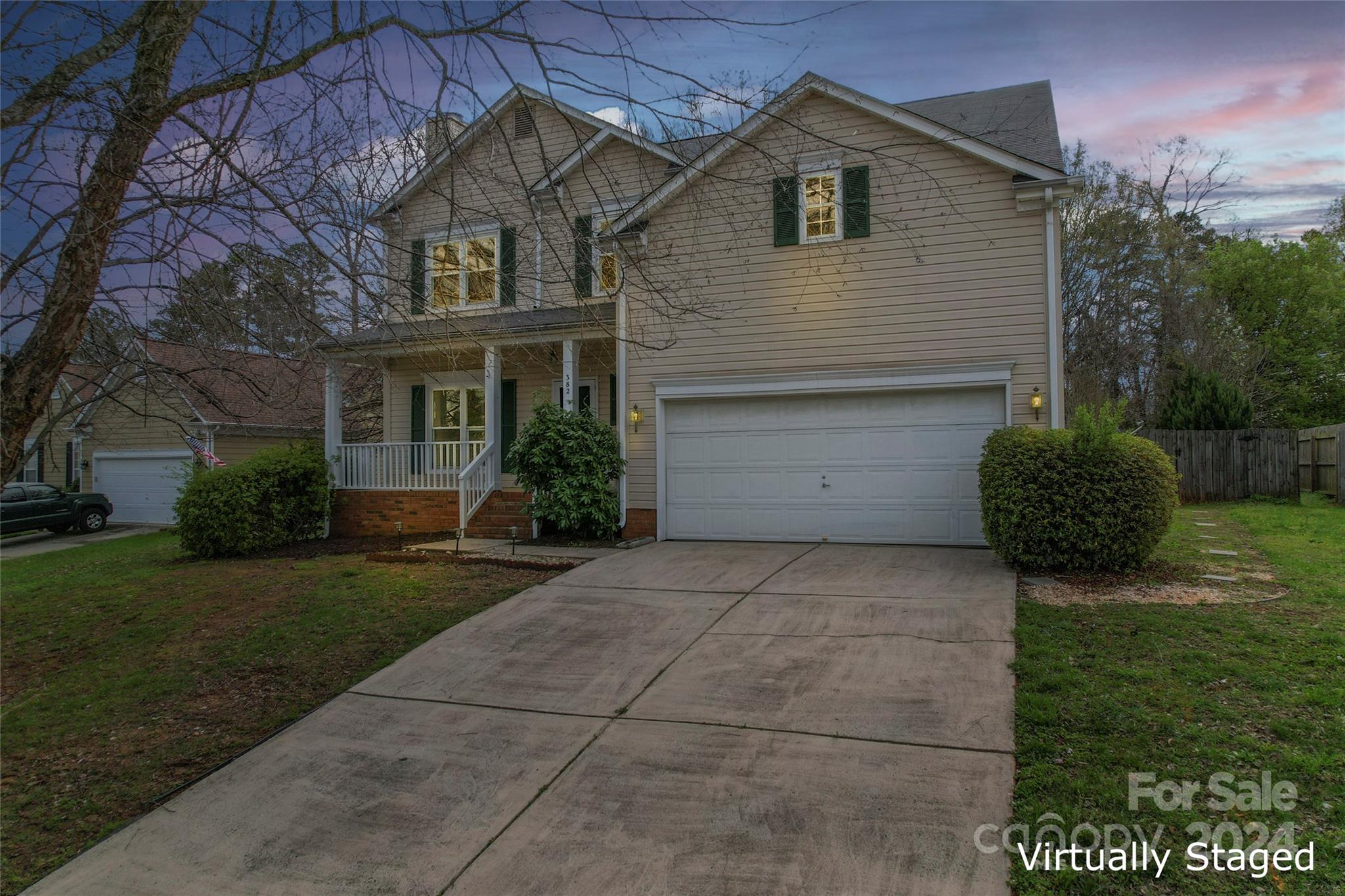 Exceptional 2-story home in Concord! Located conveniently near Hwy 49, shopping, grocery stores, and more. This well-maintained property features mature trees, a charming rocking chair front porch, new painted cabintry, and newer bamboo flooring throughout the main floor. Cozy up by the gas fireplace with a stone surround.  The breakfast area seamlessly transitions into a sunroom/flex space. Upstairs, The primary bathroom has been updated with a walk-in shower, soaking tub, and dual vanity sinks. Find new carpet, 2 spare bedrooms with a spacious 3rd bedroom that could serve as a bonus room, offering ample accessible attic storage. The large fenced-in lot offers privacy and outdoor space. Enjoy the screened-in porch and back deck for entertaining or relaxing. This home is a perfect blend of comfort and functionality for modern living.