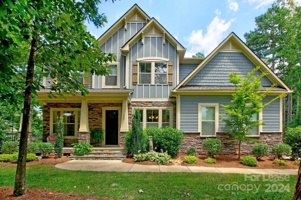 FURNISHED and absolutely STUNNING home located in a tranquil, lakefront neighborhoods only 5 mins from everything! This meticulously maintained Craftsman style home is bright, open &  features dramatic 10' ceilings, beautiful wide plank hardwoods, a separate Study with coffered ceiling, a separate office AND a tranquil sunroom for relaxing and unwinding! Gorgeous Kitchen w/ seating at island, lots of cabinet & counter space, walk-in Pantry and drop zone leading to 2 garages. Primary bdrm includes flex space & luxurious Bath w/tiled shower, spa tub & huge walk-in closet. Generous sized secondary bdrms each with adjoining bathrooms & walk-in closets. Enjoy time in the Media Rm with movies and games. Through the lovely screened-in porch, enter a flat backyard with outdoor grill and firepit -- perfect for family and friend time! Don't forget the single and double car garages for your vehicles and extra "stuff." Linens, washer/dryer, small appliances and more are included. LAWNCARE too!