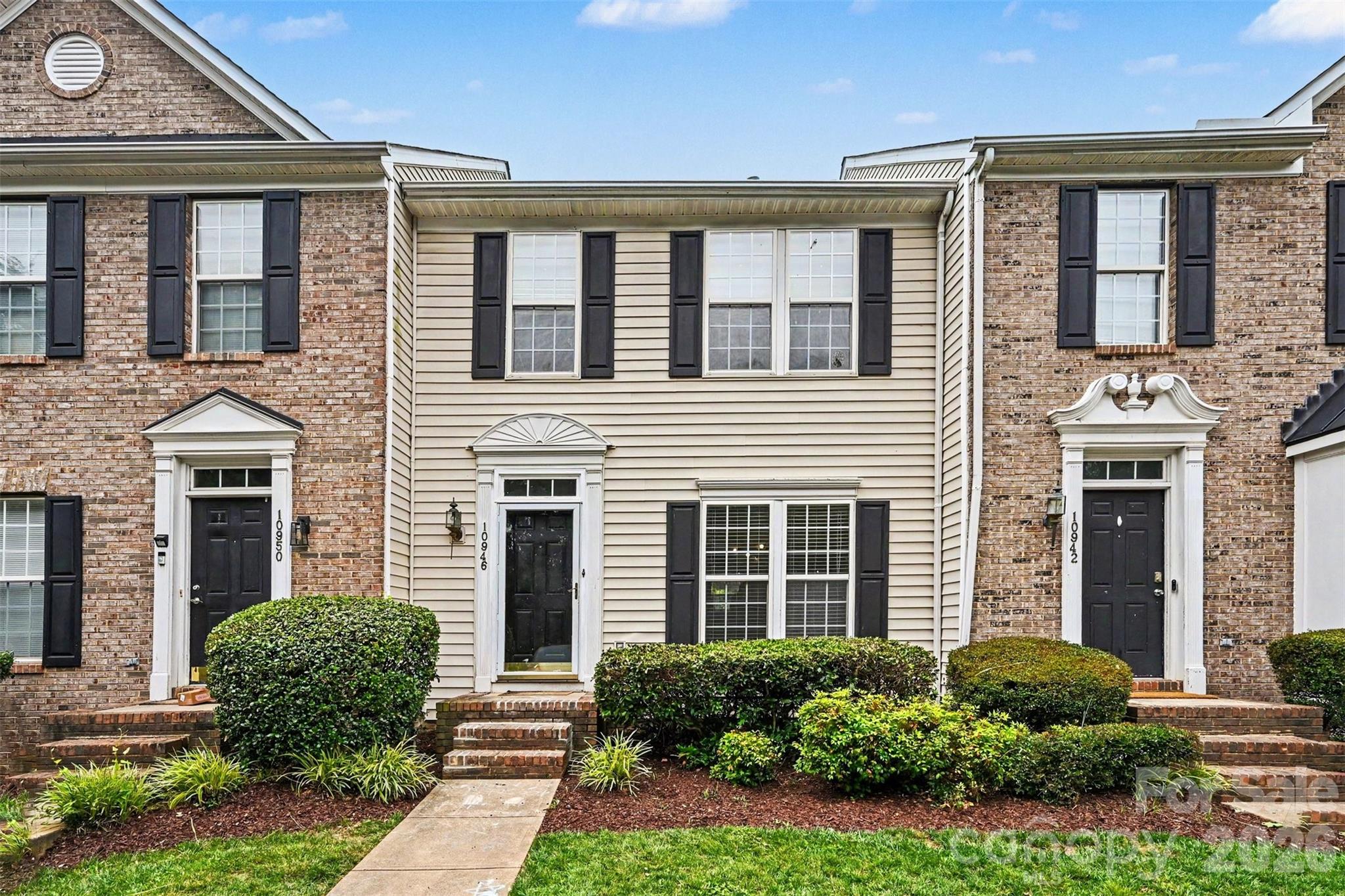 QUALIFIES FOR 100% FINANCING!! Welcome to this spacious townhome in the Garden Oaks neighborhood. One of the larger units available, offering nearly 2,200 square feet of comfortable living space.  This home boasts the LOWEST PRICE PER SQFT IN THE NEIGHBORHOOD - 3 large bedrooms, 3 1/2 bathrooms and provides plenty of room to live, work, or entertain.  The main level is highlighted beautifully with hardwood flooring throughout the entry, living room, and dining areas. The layout opens up to the spacious kitchen, equipped with plenty of counter space, a freestanding island, tile backsplash, ample cabinet space, and even a pantry if that isn't enough.  Upstairs, you'll find the generously sized primary bedroom separate from the rest with its own walk-in closet, tray ceiling, and attached bathroom with a double sink vanity. The Upstairs also features a second generously sized bedroom and a shared full bathroom, while the lower level offers an additional third bedroom, updated full bathroom, and flexible living space for an office with direct access to the walk-out patio.   Conveniently located with easy access to nearby shopping, recreation, dining, and the major freeways I485 & I77. Schedule your showing today!