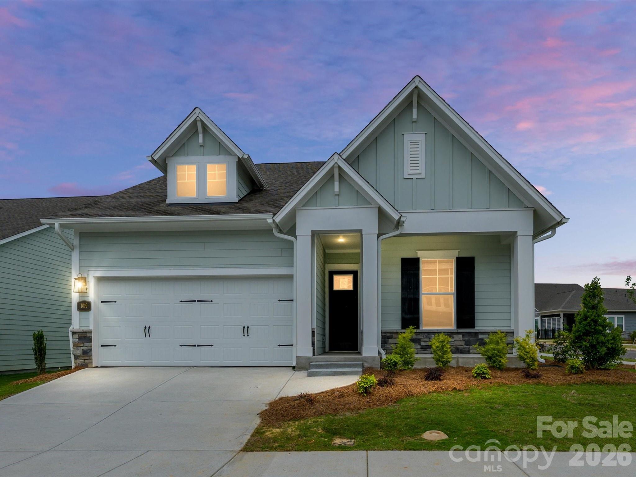 Welcome to your new ranch in Waxhaw, NC.   This award-winning home design highlights everyday conveniences and beauty.   The designer kitchen at the heart of your home is designed to be a stylish place to cook signature dishes with ease! Large dining offers extensive additional cabinetry.  Frost perimeter cabinets are paired with the large Frost island.  Solid surface flooring throughout makes for easy maintenance and durability.  Your owner’s retreat, tucked privately at the rear of this ranch,  is a special place to begin and end each day.   A zero- entry shower (with tile to the ceiling) is a showstopper in the owner’s bathroom.    Enjoy sunrise from your covered porch. Corner home site. Move-in ready with blinds added! Become a part of the Streamside lifestyle today!