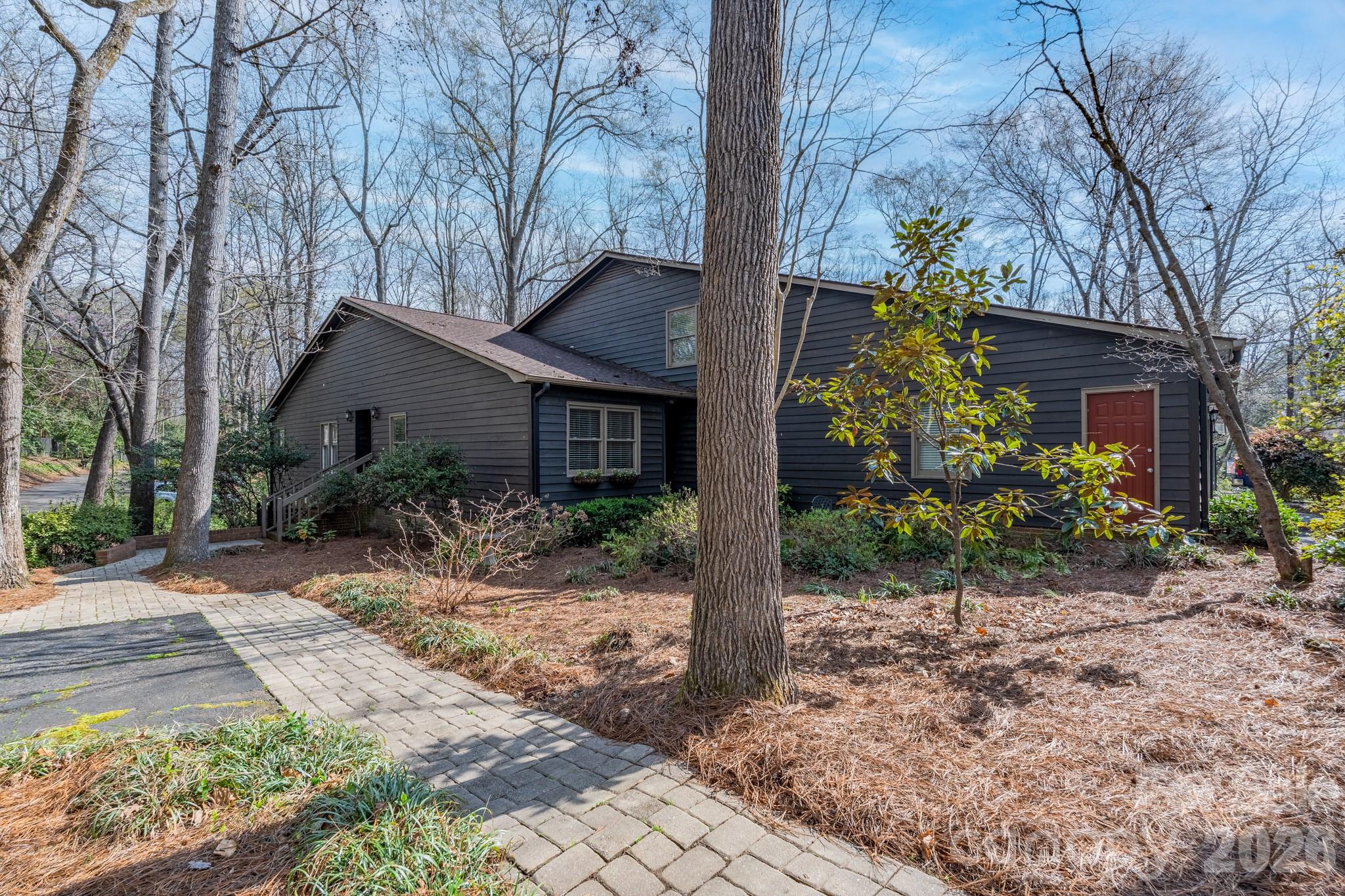 Nestled among the trees, this meticulously maintained four-bedroom, three full bath condo in Cross Creek is ready for new owners.   The main level, with hardwood floors, has an open flow from the family room, kitchen, and dining area.  The spacious family room is highlighted by a fireplace with gas logs and vaulted ceiling.  Enjoy preparing your meals in the kitchen, with granite countertops and stainless appliances, that overlooks the dining area, making a great entertainment space.  A cozy sunroom that can also serve as an office is a great addition to this home.  A primary bedroom with private bath is on the main level as well as two additional bedrooms and a second full bath.  Need a second primary suite?  This one is for you!  The upstairs is a great second primary suite with full bath that could serve as a fabulous guest area.  A covered deck overlooks the natural landscaping of this condo community.  Storage space on the lower level is an added bonus. The community pool is going to make those summer days cooler and the clubhouse, with mini-kitchen and furniture, can be reserved for special events at no charge.  Located in a great area and in close proximity to shopping, hospital, grocery stores, and so much more, you don't want to miss seeing this one.