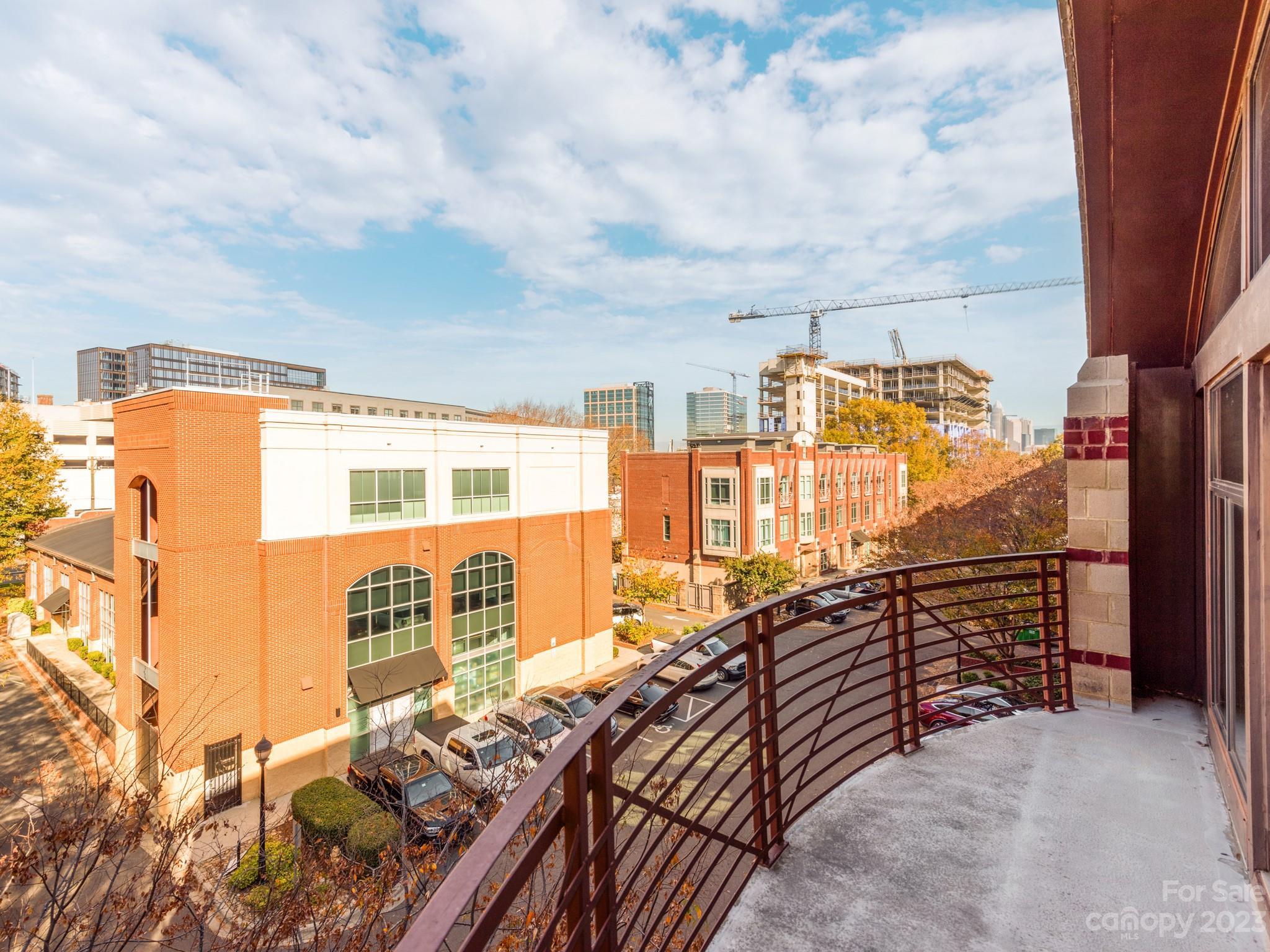 Now has 2 Private Enclosed Bedrooms as the original model had 1 enclosed bedroom and a loft! Rare opportunity to own an Exceptional Fully Renovated Penthouse Suite End Unit, with 2 large exterior covered decks and Private City Skyline and Tree Views in the heart of SouthEnd. This Unique 2bd 2bth Condo has True White Oak Color Hardwood Floors, Quartz countertops and backsplash in the bathrooms and Kitchens, tall Ceilings, a breakfast bar, upgraded light fixtures, and an overall open and airy feel to it with tons of natural light. There is no limit to the amount of parking as the gated parking garage solves much of the needs with parking for you and your guests. The Location is prime as SouthEnd, Dilworth, Uptown, Lightrail, and top restaurants are all within walking distance! This is one of SouthEnd's most popular buildings!