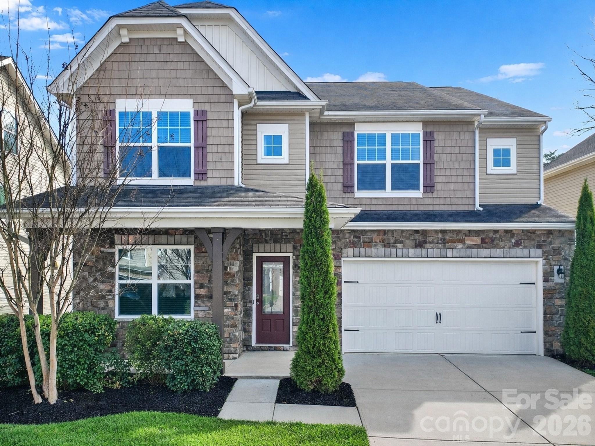 Beautiful, move-in ready 5-bed, 4.5-bath home in desirable Berewick in Steele Creek. Residents of Berewick enjoy exceptional amenities including a clubhouse, junior Olympic pool, basketball and volleyball courts, playgrounds, and miles of walking trails. Covered front porch invites you inside this open floor plan featuring 9-foot ceilings, neutral paint, stylish archways, whole-home blinds, and hardwoods throughout the main living areas. Kitchen offers pendant lighting, tile backsplash, granite counters, stainless appliances, and a 5-burner gas range with double ovens. Adjoining breakfast area, family room with a cozy gas fireplace, and dining room create the perfect spaces for everyday living and entertaining. A dedicated office provides an ideal work-from-home setup, while the main-level bedroom with attached bath is ideal for guests or multi-generational living. Upstairs, you'll find the spacious primary with an ensuite that includes a vanity with two sinks, soaking tub, shower, and walk-in closet. Three additional bedrooms, each connected to a full bathroom, along with a versatile bonus/loft area and laundry room with linen closet complete the second level. Enjoy the tree-lined backyard while relaxing on the paver patio with sitting wall. AC replaced in 2022. Home was recently professionally cleaned and the exterior and driveway power washed. Conveniently located near I-485, I-85, and I-77. Easy access to Uptown Charlotte, Charlotte Douglas International Airport, the U.S. National Whitewater Center, and Charlotte Premium Outlets.