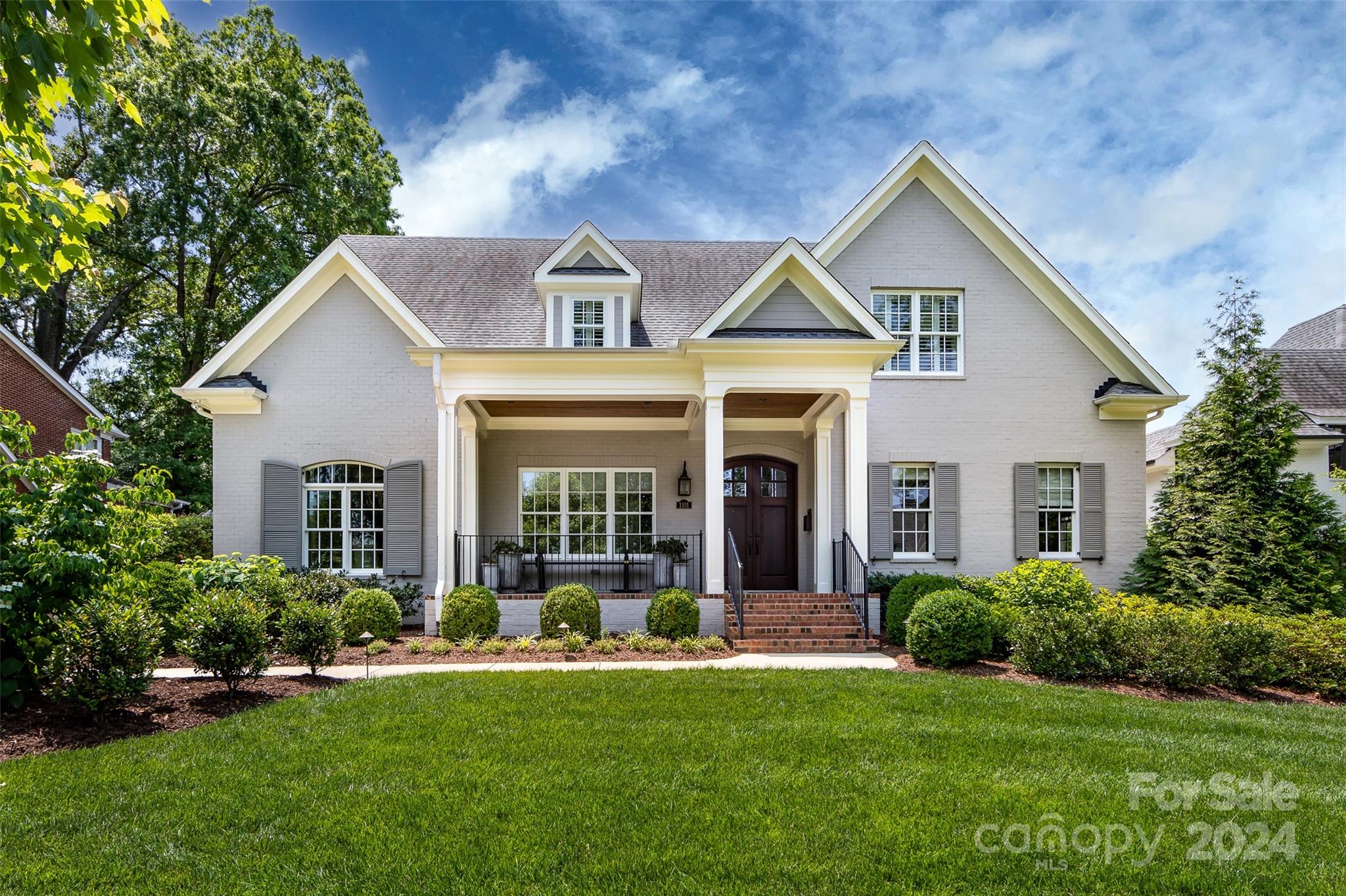 Stunning custom home situated in desirable Myers Park! Built 2015/2016, 1101 Ardsley features top-of-the-line finishes plus garage apartment w/ full bath & laundry! Features incl. 10' ceilings on main, 9' on 2nd level, beautiful hardwoods & open floorplan. Study w/ built-ins & SubZero wine tower. Formal dining connects to bar area w/ wine fridge. Family room w/ coffered ceiling and FP blends with gleaming Chef's kitchen featuring marble countertops, center island, Wolf gas range, SubZero fridge/freezer, & walk-in pantry. Primary suite on main w/ 2 walk-in closets and impressive en-suite bath w/ vaulted ceilings, soaking tub & oversized walk-in shower. All secondary bedrooms w/ attached bathrooms! Large bonus on 2nd level w/ built ins. Incredible outdoor living on the covered front porch or back terrace w/ blue stone pavers and motorized retractable screens. Pristine fenced yard w/ mature privacy landscaping and built-in gas grill! Perfect in-town location close to shops & restaurants.