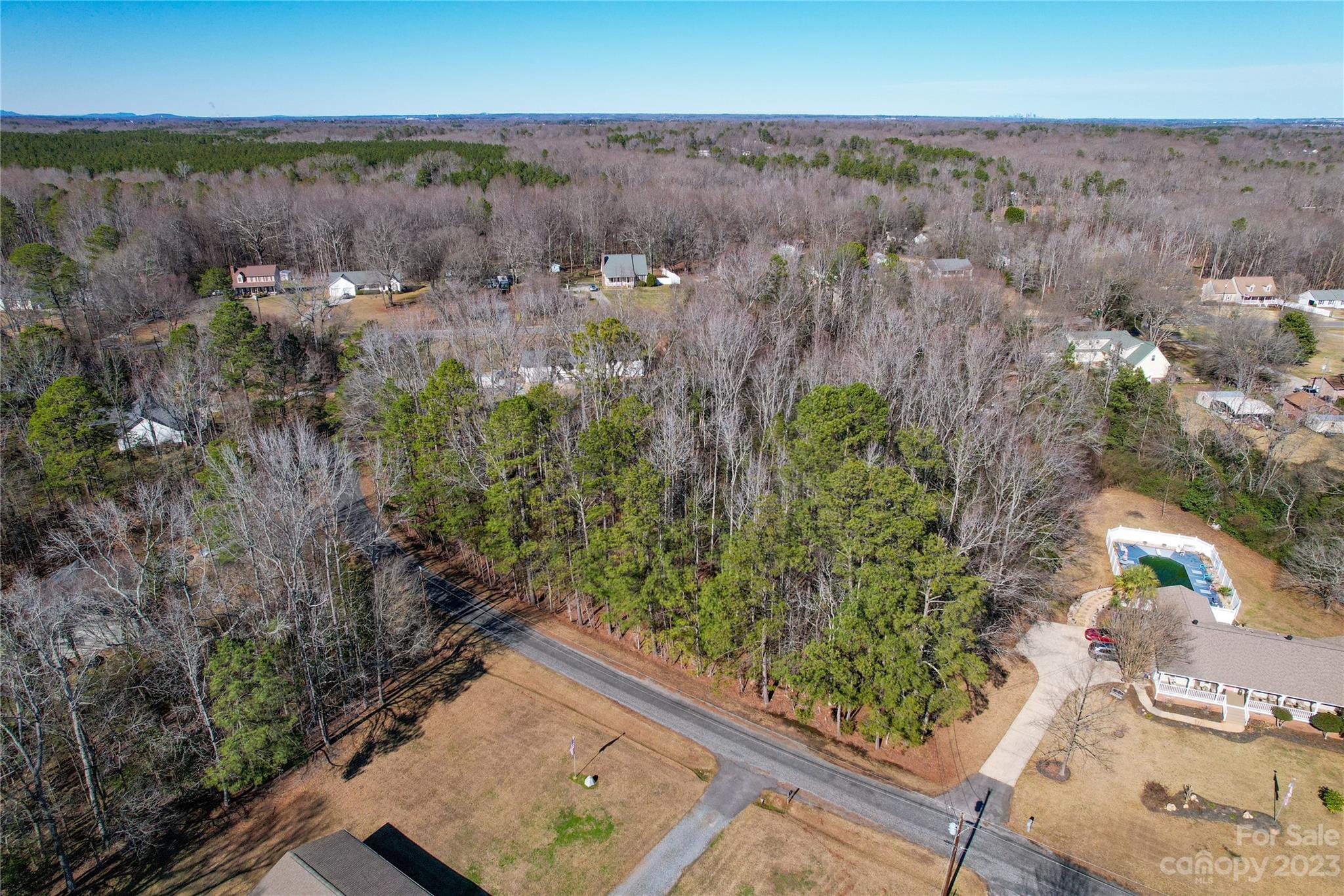 Discover the canvas for your dream home on this 1.34-acre lot in Rock Hill, SC. Just minutes from I-77, shops, and dining, but nestled on a tranquil road, this property offers the perfect blend of convenience and serenity. No HOA, over 250ft of road frontage, quick access to the interstate and only 30 minutes from Charlotte. Seize the opportunity to create your oasis in this quiet haven. Don't miss out - your dream home awaits!