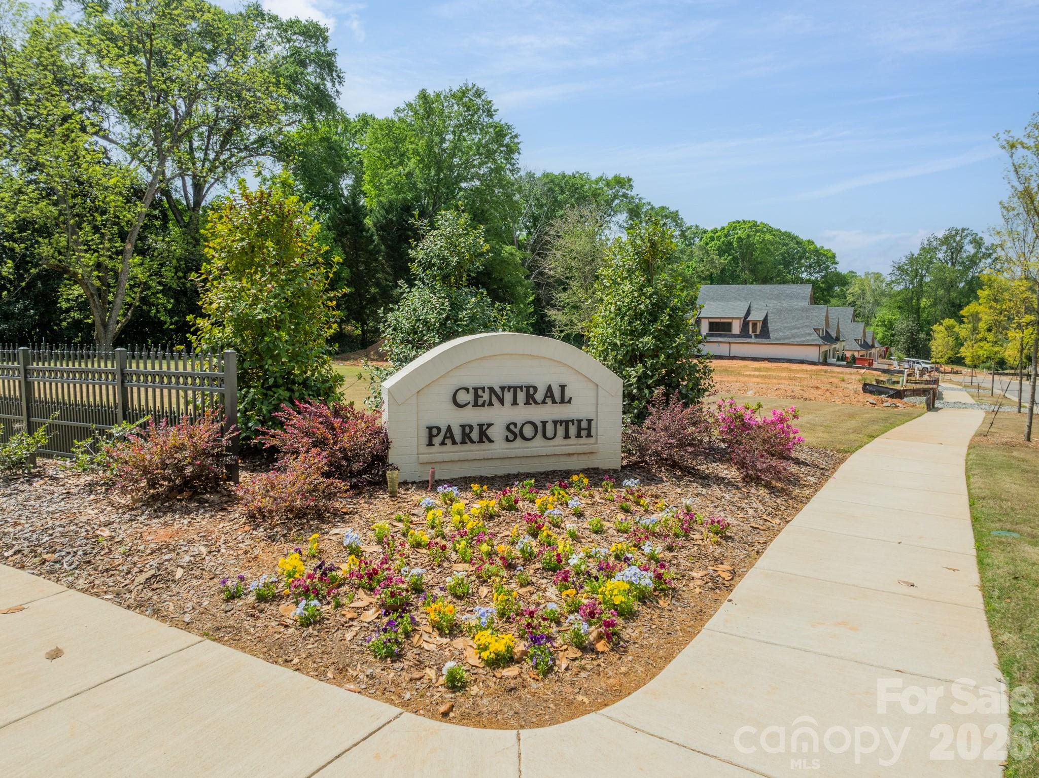 New beautiful homes are now completed in Central Park South and they are off-the-chart gorgeous!! McSpadden Custom Homes is proud to present Central Park South in Belmont NC. A European-inspired design of luxury single family homes, these stunning custom-style new homes offer residents the best of both worlds - the convenience of city living with the tranquility of a park-like setting. Central Park South homes feature design and finishes that are sure to impress even the most discerning buyer. The HOA service package takes care of all your exterior home maintenance needs so you can spend your time enjoying your new home, community and ability to lock and leave with no worries! Enjoy walking or using your golf cart to take advantage of the restaurants, coffee shops, park and festivals within a few minutes from your doorstep. Quick access to the Charlotte Douglas airport, highways and all that the city of Charlotte NC has to offer. Lake Wylie sports and Daniel Stowe Botanical Garden all very close by as well. So much to love about this amazing location and beautiful new homes. There are a couple homesites remaining so come take a tour today!