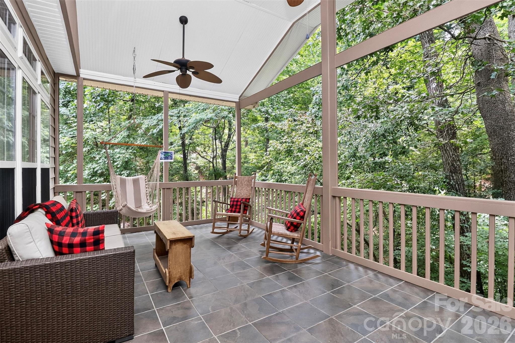 Looking for space, value, and top schools? This South Charlotte home delivers all three. Located at the end of a quiet cul-de-sac in one of Charlotte's most desirable school districts, the home offers exceptional square footage at a compelling price per square foot.
Inside, you'll find spacious living areas, four bedrooms, and a walk-out basement with endless possibilities—including recreation space, a future fifth bedroom, guest quarters, or multigenerational living. The basement already features a pool table and entertainment area ready for family gatherings.
The standout feature may be the elevated screened porch overlooking mature trees, creating a peaceful treehouse-like setting rarely found in suburban Charlotte.  The over half acre lot is primarily wooded with a flowing stream, so lawn maintenance is minimal.  A definite must see!