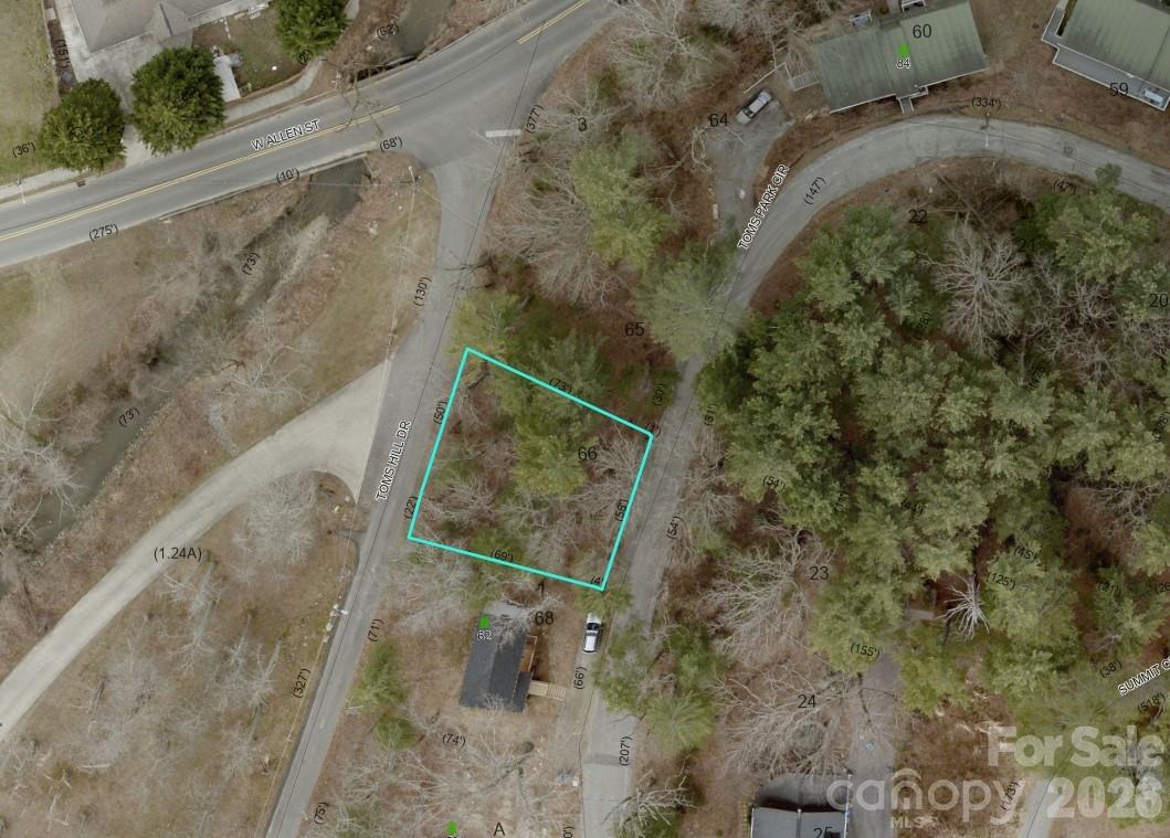 Approximately 0.11 acres on Toms Park Circle with potential view of Hendersonville. Enjoy a highly convenient location within walking distance of downtown restaurants, shopping, and entertainment. Public water and sewer available.