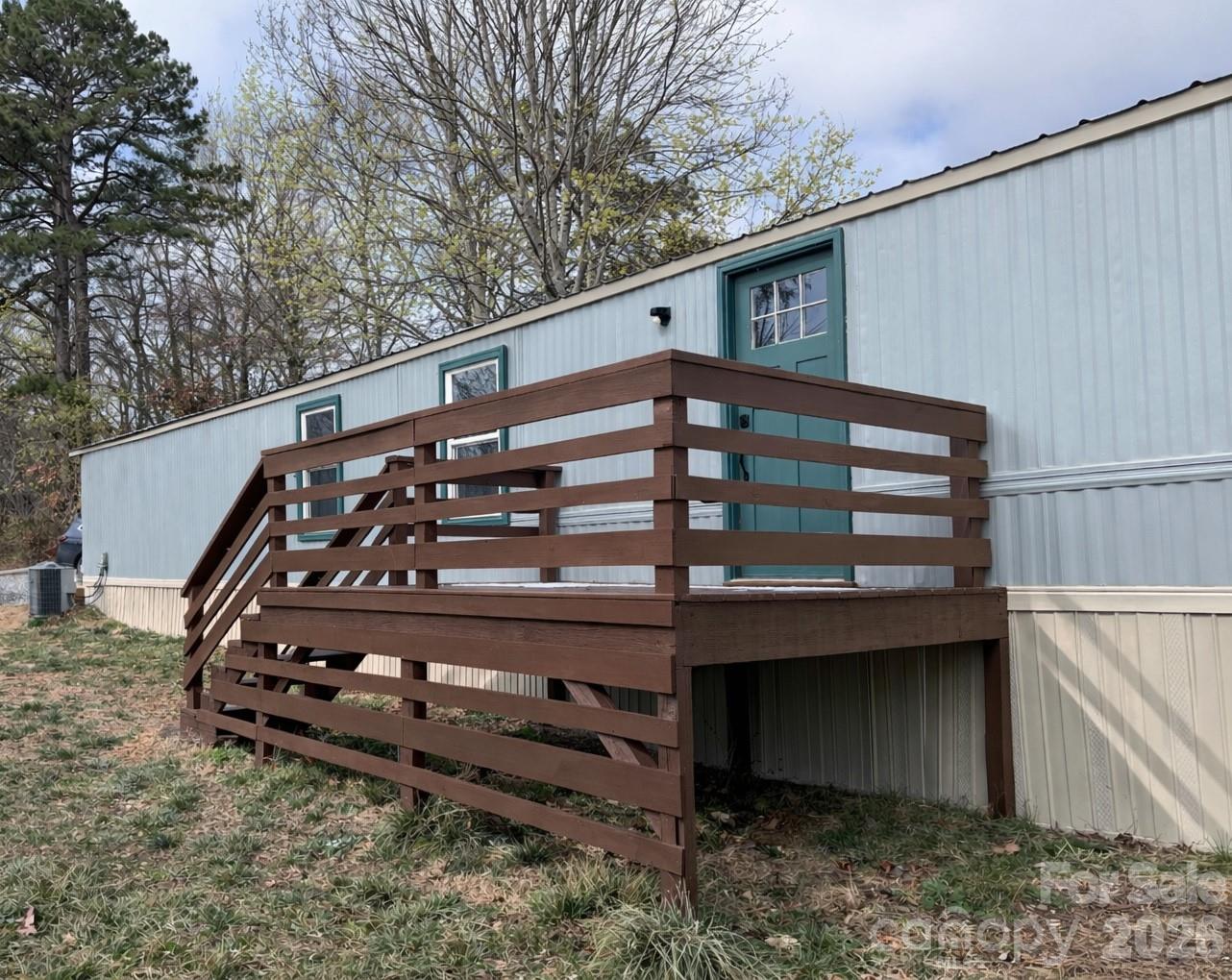 Fully renovated 1120 sqft home with 2 bedroom, 2 full bath located approximately 3.5 miles from downtown Asheville. Set on nearly half an acre with city water and private septic. Renovations include an updated kitchen and bathrooms, refreshed interior finishes, and central heat and air. Washer and dryer hookups installed. Convenient access to everyday amenities and the future Whitewater Park. Move-in ready with outdoor living space.