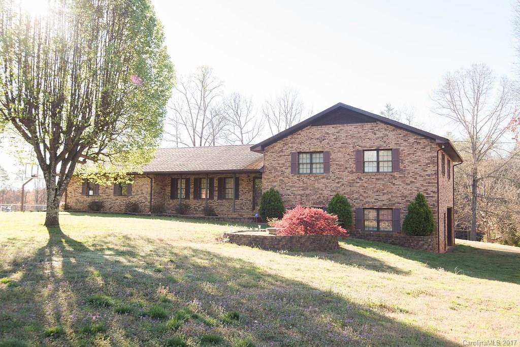 3 BR, 2.5 BA home offers approx 2400SF of space including a formal living, dining area overlooking rear yard, an open kitchen with skylights, the rear patio overlooking the rear yard, and multiple parking areas including the drive in basement garage and main level 2 car garage. The master bedroom retreat has its own garden tube bath room and ample closet. The home is bright and open. The basement is 1/2 finished with den - the other 1/2 is unfinished for storage and the garage.