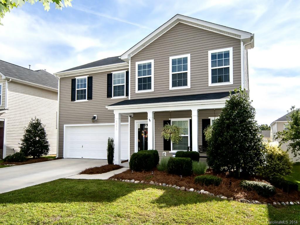 Beautiful, impeccably maintained former Ryland model home! Wood floors on much of main level, custom paint, kitchen features granite countertops, stainless appliances and island.  Four bedrooms up with open loft, master with separate garden tub and shower. Refrigerator, Washer and Dryer included!  Fenced yard with expanded stamped concrete patio.  Convenient to shopping and schools...Don't miss out!