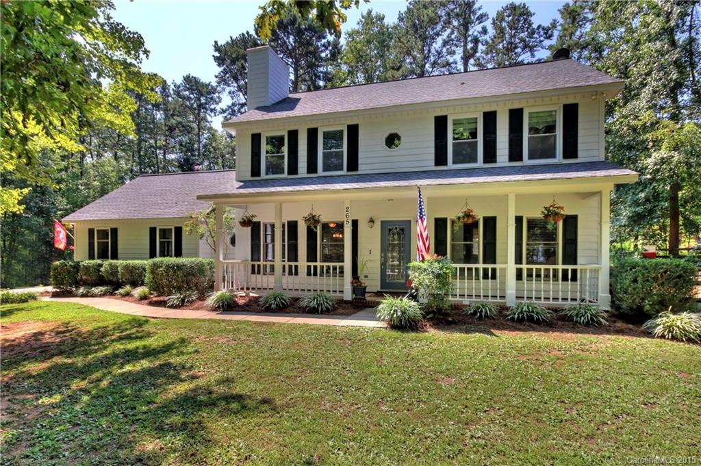 PRIME LOCATION, PREMIUM WOODED 1 AC LOT!!  BOAT SLIP w/Lift!  WATER VIEWS front & back of this family home. Fenced yard, gardens, Hot Tub, outdoor workshop & 10'x16' shed.  Room to add-on or build your mancave garage! Woodland Heights/Lake Norman school dist!

Fully remodeled kitchen w/gas cooktop, wine cooler, convect oven.  
New hardwood floors, updated baths and fresh painted walls.  

Located within the Point area on desirable Stonemarker Rd! 
Boat slip w/PolyLift....BEAUTIFUL SETTING!