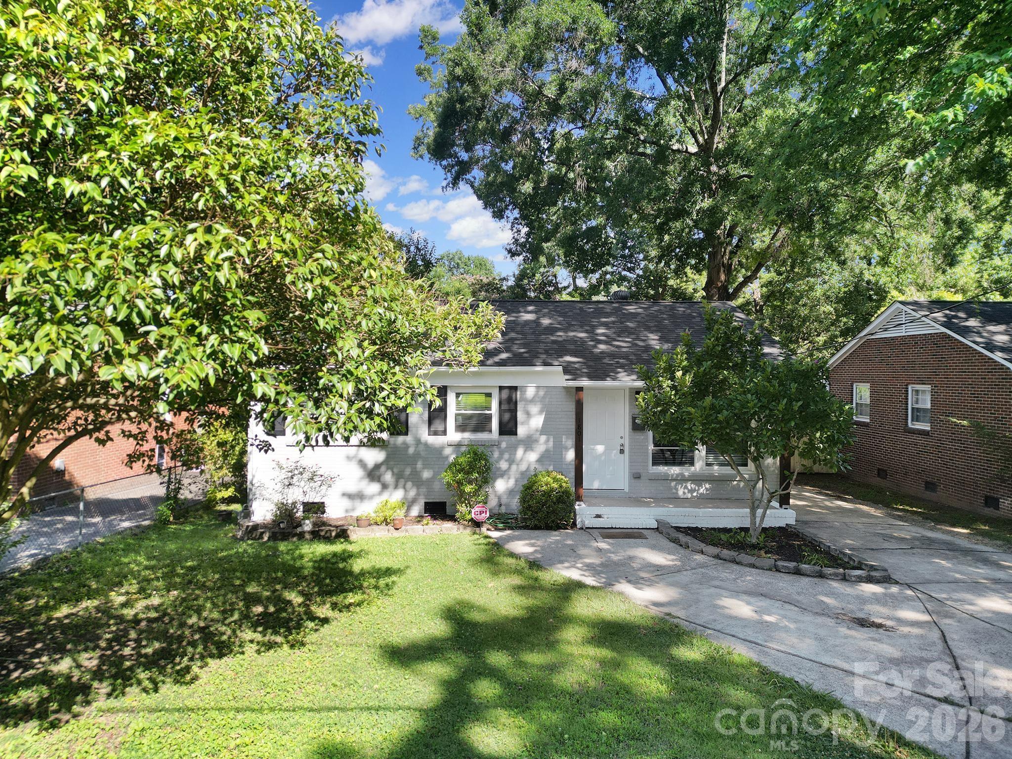 1801 Dallas Avenue in Charlotte, North Carolina, is a classic  ranch-style home located in the growing Oakhurst/Summey Heights area of Charlotte. The single-story residence offers approximately 1,378 square feet of living space with three bedrooms and two full bathrooms, situated on a generous 0.22-acre lot. Its traditional layout provides comfortable everyday living, while the spacious yard offers ample room for outdoor activities, gardening, or future enhancements. Conveniently positioned near The Plaza, the property enjoys easy access to popular neighborhoods such as Plaza Midwood and NoDa, known for their restaurants, breweries, entertainment, and local businesses. With its solid mid-century construction, established neighborhood setting, and proximity to some of Charlotte’s most vibrant districts, the home presents an appealing blend of character, convenience, and potential for modernization. with Modern updated through out From flooring new Cabinets/ kitchen appliances  and paint and new roof and windows .