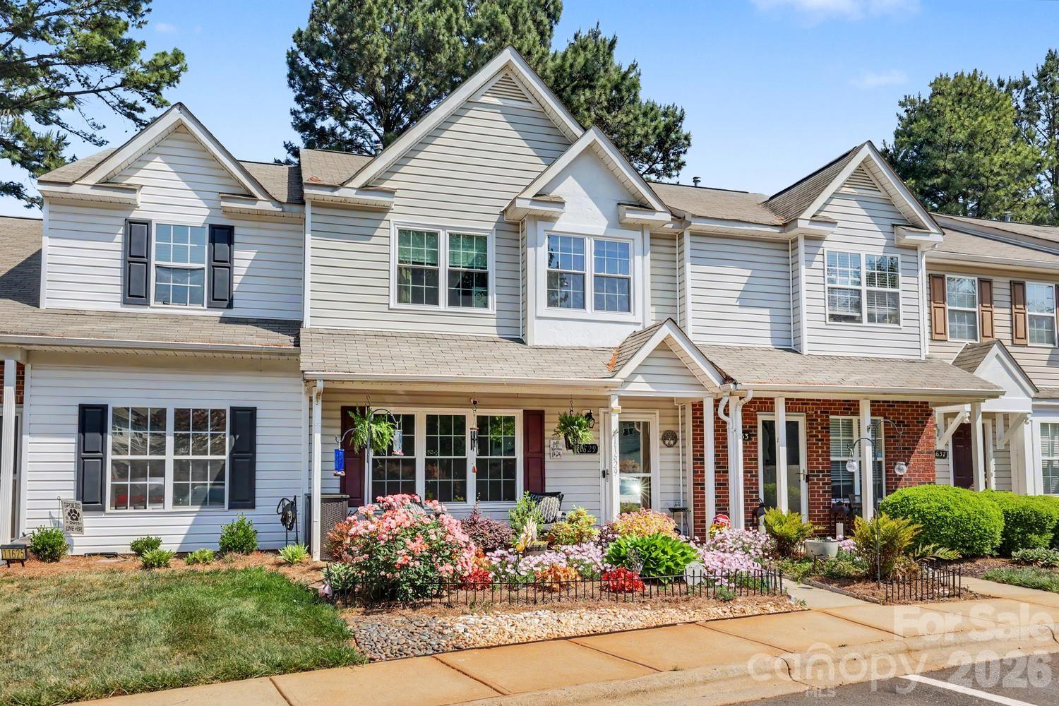 Tons of upgrades! You won't be disappointed. Welcome into the open living room with a cozy gas fireplace and tons of natural light. Warm luxury vinyl flooring throughout downstairs makes this home functional and designed for comfortable living. The bright, modern kitchen has an inviting feel with a mix of contemporary and rustic elements. Upgraded features include granite countertops, stainless appliances, gas range, textured stone backsplash, pendant lights and an island perfect for morning coffee or afternoon snacks. Upstairs you'll find the primary bedroom with vaulted ceilings and an upgraded ensuite bath with oversized tiled shower and dual vanity. Two more spacious bedrooms and a full bath complete the upstairs. Private back patio is the perfect space for relaxing or grilling out! Community pool! The low-maintenance exterior and HOA-covered services allow you to spend more time enjoying your home and less time on upkeep. Located just minutes from interstates, restaurants and shopping! HVAC-2024, windows-2014 are just a few of the updates. This home is move in ready and offers comfort, style and convenience making it easy to settle in and enjoy right away!
