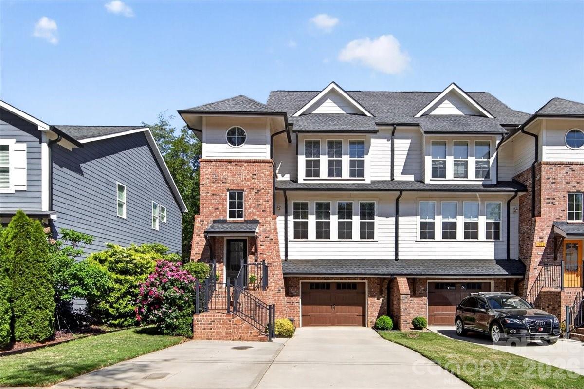 Beautiful Cotswold Gem!  This home exudes sophistication and style. The large, bright two story foyer captures your eye in this 2900+ SF floor plan. The home features beautiful appointments from hardwood oak floors, shiplap detail to the incredible tile selection throughout.  The kitchen with quartz counters, gas stove and pantry are a cook's dream.  French doors open to the rear deck for seamless indoor/outdoor entertaining.  Upstairs, the large primary suite boasts a tray ceiling, more amazing natural light, an ensuite with dual vanity, oversized shower stall and closet with a built-in closet system. The secondary bedrooms on the upper level share a beautifully appointed 3 piece hall bath.  There is gorgeous wainscoting panels in the guest bedroom.  The lower level boasts a three piece bath, a great room or 4th bedroom with direct access to the lower patio and fenced-in yard.  This is a perfect area for additional entertaining and/or a pet friendly space.  Oversized attached garage that allows for extra storage.  Extra wide driveway that is ideal for everyday use and guest parking.  Incredible Cotswold location that is minutes from Common Market, Nightswim Coffee, and other retail.  It is right down the street from Charlotte Swim and Racquet Club.  Excellent value for a newer home with this location, almost 3000k sq ft, and a garage!!  Sellers are happy to contribute to buyer rate buy down.