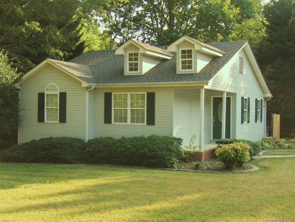 Precious bungalow with 3 bedrooms, 2 full baths on a corner lot just 1/4 mile from South Point High School in Belmont.  Home has been updated with new flooring, paint and fixtures. Sitting on a corner lot, this home has it all. Vaulted ceiling in living room gives charm and quality to this unique home. Close to downtown Belmont, Lake Wylie, great access to I-85 and U.S. 29-74 for those commuting to Charlotte.
