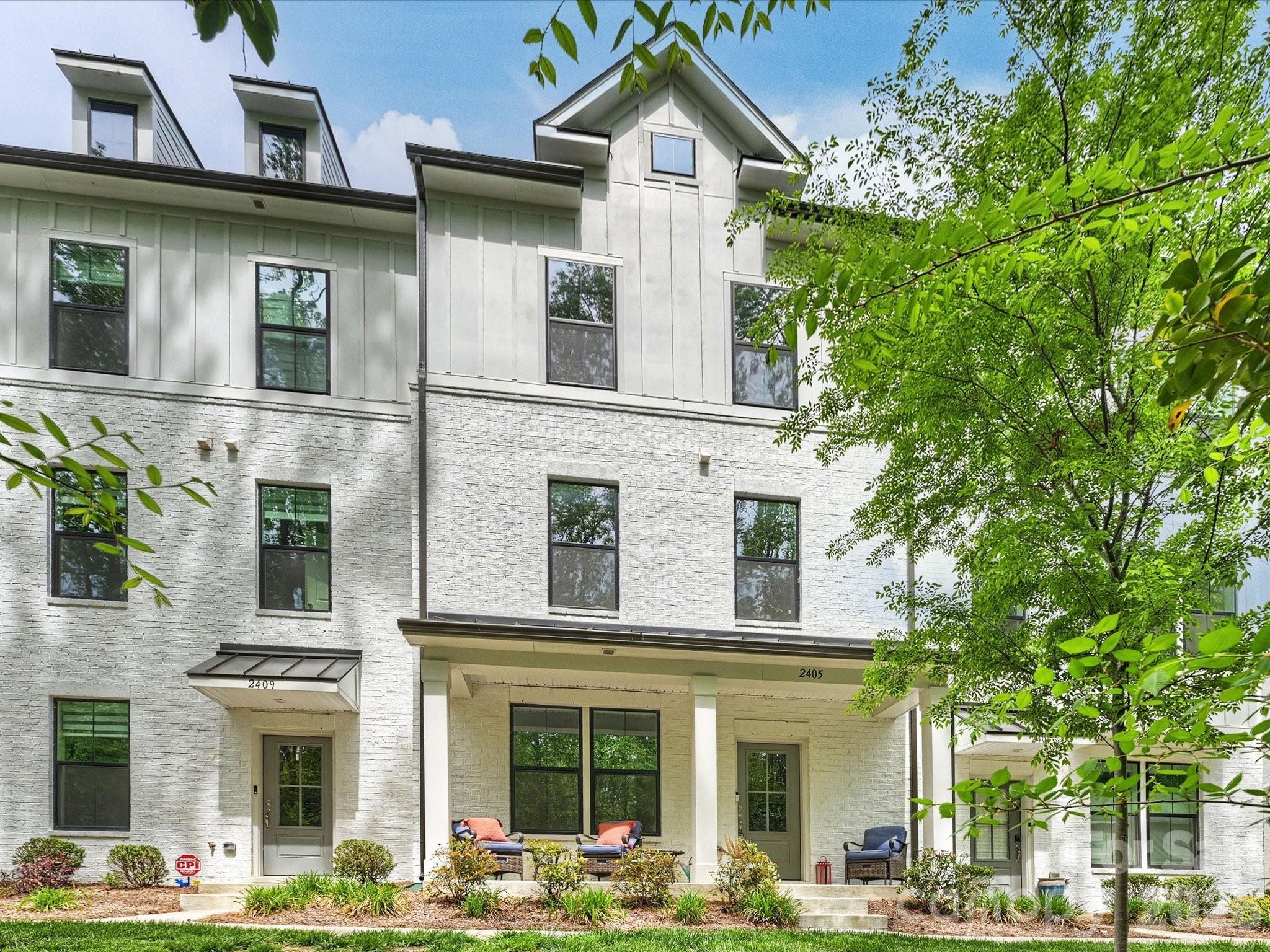 Welcome to The Townes of Cotswold—where comfort, style, and convenience come together in this beautifully maintained, like-new townhome. Owned by just one owner, this turnkey property stands out with a premium lot that backs to a wooded area, offering rare privacy and a peaceful setting.

A charming front porch welcomes you home, while inside you'll find upgraded luxury vinyl plank (LVP) flooring throughout—completely carpet-free for a clean, modern feel. The entry level features a versatile bedroom or office space, a full bath, and access to a spacious two-car garage.

The main floor is designed for both everyday living and entertaining, with a bright, open layout that includes a stylish kitchen with a large island, a dining area that opens to a private deck, and a comfortable family room.

Upstairs on the third level, the primary suite offers a relaxing retreat, complemented by two additional bedrooms and a conveniently located laundry closet.

Located in one of Charlotte’s most desirable and rapidly growing areas, this home offers unbeatable convenience to shopping, dining, and daily essentials—making it the perfect place to call home.