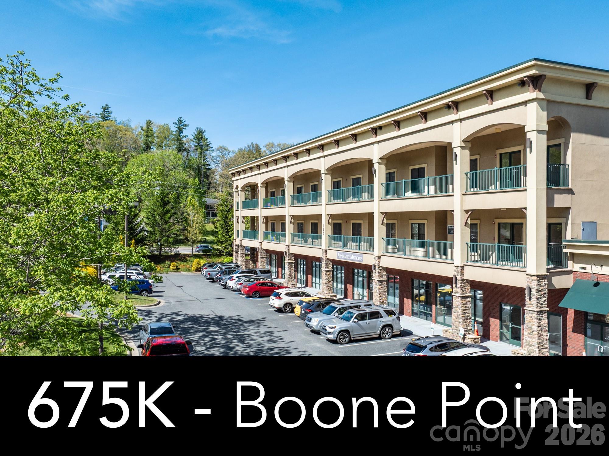 In-town Luxury Mountain condominium in Boone, NC and is conveniently located nearby to ASU, Watauga Medical Center and downtown Boone. This Top Floor, One level Mountain living features 3BR and 2BA with a covered, stamped concrete patio with a built-in stainless steel grill. As you enter the home, updated hardwood floors go throughout the home and custom ceramic tile is featured in bathrooms and entryway foyer. Both bathrooms have been updated with beautiful custom showers. This condo has custom tray ceilings with unique wood treatments and designer chandeliers. There are two raised hearth stack stone fireplaces, one in the living room and one on the outdoor patio. Also featuring an amazing chef's kitchen with a wall oven and microwave. The kitchen also features Custom Beautiful cherry cabinetry with designer pulls and there are custom Granite counter tops with tile backsplash. The center piece is an oversized huge Kitchen island with built-in wine rack and drawer storage. The appliances are upgrades from the standard package. A Large primary suite has a sliding door to the covered patio and spacious walk-in closet. The primary bath features a large double vanity, arched tile shower and a whirlpool soaking tub. All closets have been upgraded with custom shelving and storage. There is also a spacious Laundry room that will also accommodate a full size washer/dryer. There are Two reserved parking spaces in lower level parking garage with a convenient elevator.