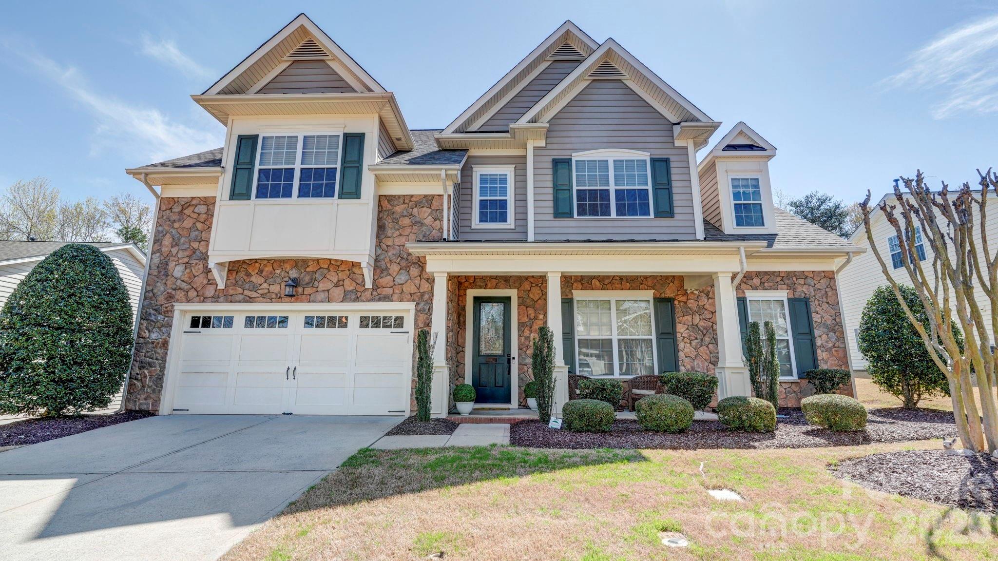 Welcome to this beautifully maintained two-story home in the highly sought-after Reserve at Gold Hill, one of the area's most desirable communities known for its top-rated schools and exceptional neighborhood amenities. Residents enjoy a resort-style lifestyle with access to a sparkling swimming pool, pickleball and basketball courts, walking trails, and playgrounds. Move-in ready and thoughtfully designed, this home offers the convenience of a spacious primary suite on the main level, creating the perfect blend of comfort and functionality. Elegant decorative wall features, crown molding, brand-new hardwood flooring, and a freshly painted neutral color palette provide timeless style throughout the main living areas. Step inside and be greeted by a stunning two-story family room centered around a cozy fireplace. The open-concept layout seamlessly connects the family room, kitchen, and breakfast nook, all overlooking a peaceful 25-foot wooded buffer that provides privacy and serene natural views year-round. Upstairs, abundant natural light fills the home, highlighting a spacious loft that offers endless possibilities for a media room, home office, play area, or additional gathering space. With four bedrooms, three full baths, and a half bath, this flexible floor plan is perfectly suited for growing families, guests, and today's evolving lifestyles. Conveniently located with easy access to I-77, this home offers effortless commuting throughout the Charlotte metro area, including Uptown Charlotte and Charlotte Douglas International Airport.

Combining space, versatility, modern updates, and an unbeatable community lifestyle, this is the home buyers have been waiting for. Don't miss your opportunity to experience everything this exceptional property has to offer—schedule your private showing today.