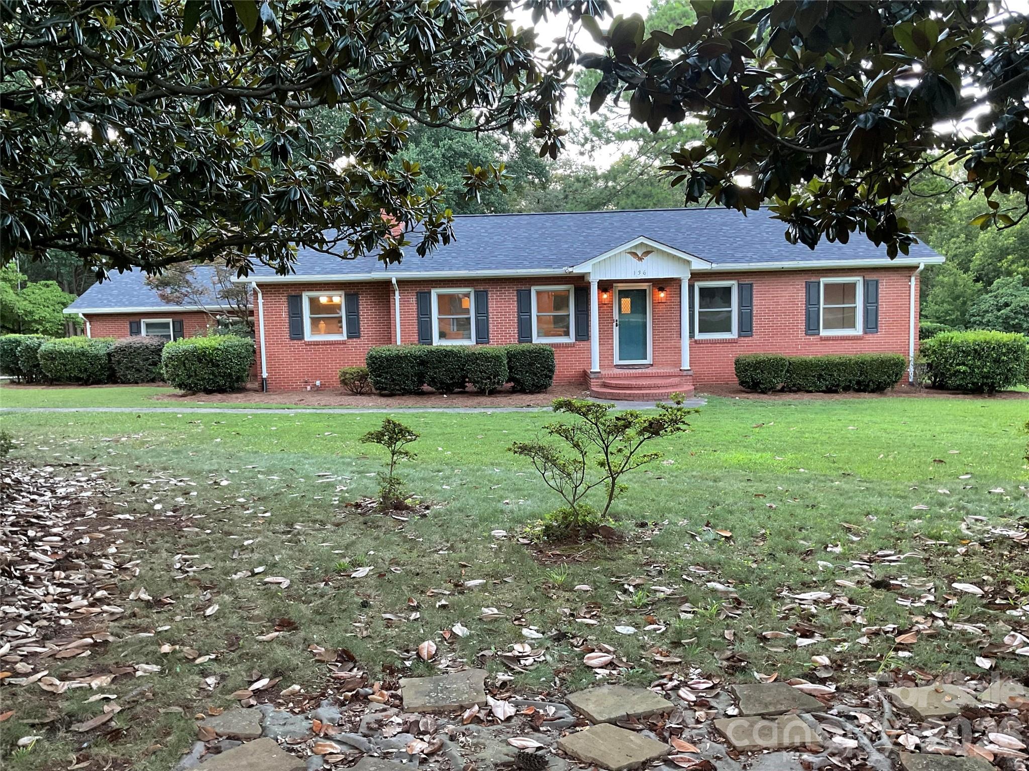 Welcome to this beautiful brick ranch in the established Coulwood neighborhood.  The yard is beautiful with awesome trees and an amazing 1