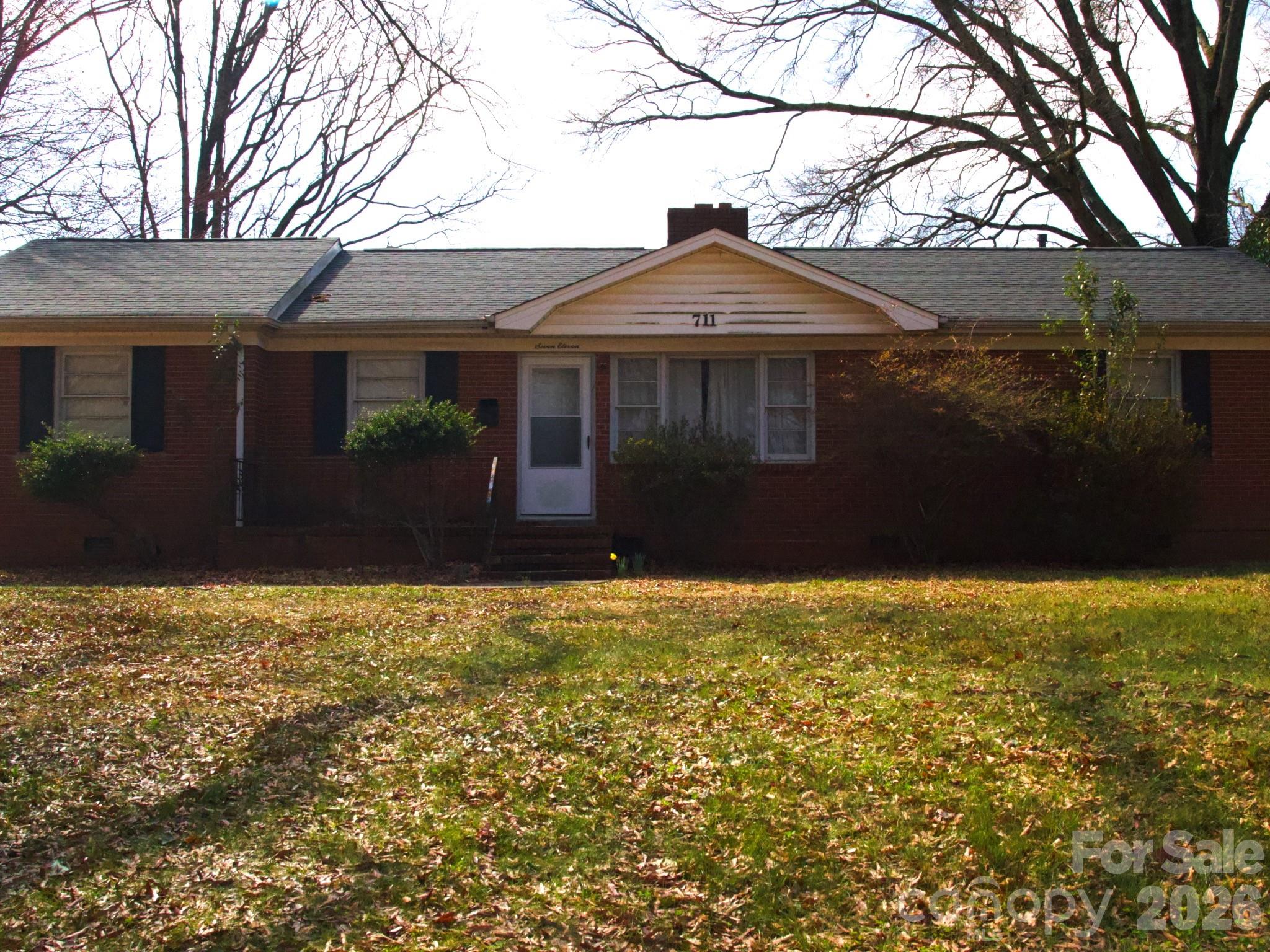 Opportunity is knocking in one of Charlotte's most rapidly transforming corridors. This solid 4 bedroom, 1.5 bath all-brick ranch sits on an expansive .42-acre lot in the Hidden Valley neighborhood, an area experiencing significant reinvestment and growth. Built in 1956 with 1,562 sq ft of heated living space, the home features a fenced backyard, fireplace, central air, forced air gas heat, a storage shed, and 2 parking spaces. The bones are strong; bring your vision and updates to unlock serious equity. Seller also owns the adjacent vacant lot at 719 Yuma St (listed separately at $225,000) and prefers to sell both properties simultaneously. Combined asking price for both parcels is $510,000. Investors, developers, and savvy buyers take note; double lots in an appreciating neighborhood don't come around often.