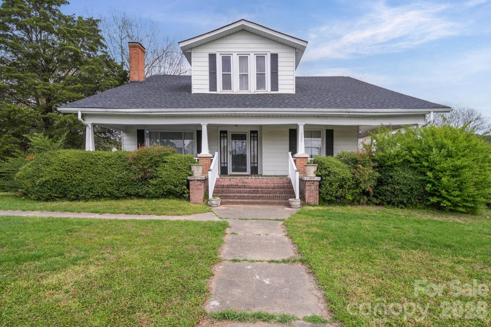 Full of charm and character, this 4 bed 2 bath 2-story home built in 1927 is one to come see.  It features large living areas, a home office, formal dining room, adequate kitchen with breakfast nook, partially fenced back yard and covered wrap around rocking chair porch.  Most recent updates include a new roof in 2025 and two new HVAC units in 2023.  This is a wonderful set up for someone looking for a historic era home.  It does need TLC, but with almost 3,000 square feet there's plenty of room to expand and capitalize on your investment. Call today for your private viewing. The seller is in the process of obtaining an estimate to mitigate water intrusion and correct pier deterioration and leveling in the crawlspace. With an acceptable offer the seller will consider paying for the crawlspace mitigation invoice at closing.