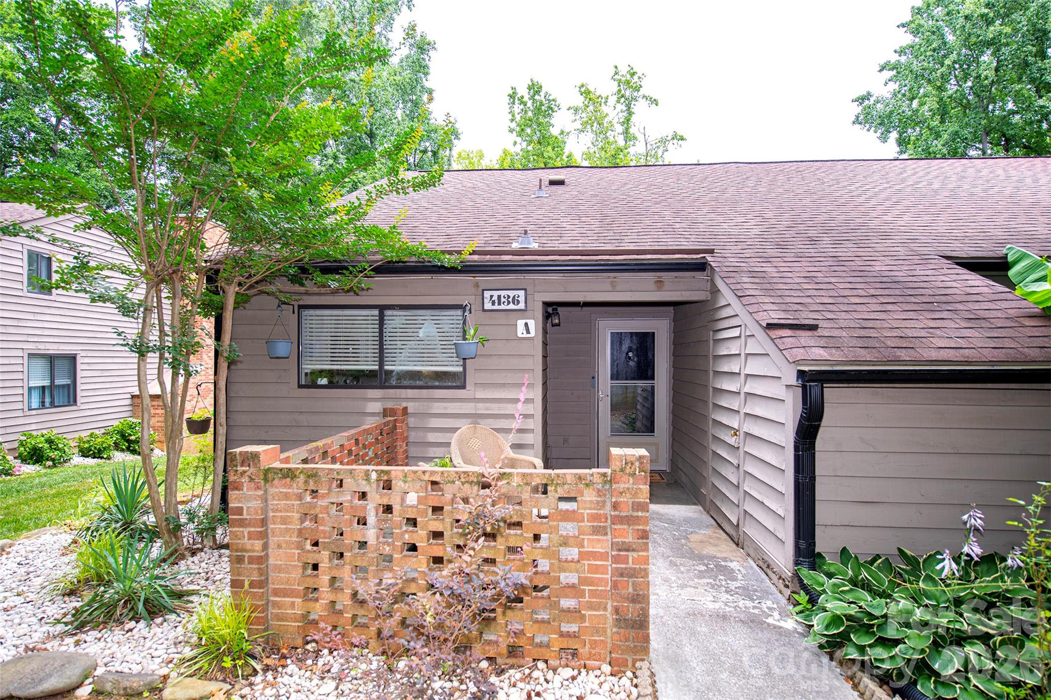 Waterfront end unit in the heart of Lake Wylie! This 2 bedroom, 2 bath home is your gateway to the lake lifestyle. Loft can be converted into a legal 3rd bedroom. Step right out the back door to fish, launch a kayak, or paddle a canoe directly from the water’s edge. The front porch patio and dedicated storage room give you the perfect setup to store all your lake gear. HOA covers exterior maintenance, community pool access, trash, water, and sewer making this a truly low-maintenance retreat. The community also offers two complimentary day-use boat slips, ideal for having friends pull up by water or making a quick run for supplies. Conveniently located near all of Lake Wylie’s best amenities. Come enjoy everything the lake life has to offer! Deeded boat slip available for purchase separately from the home price.
