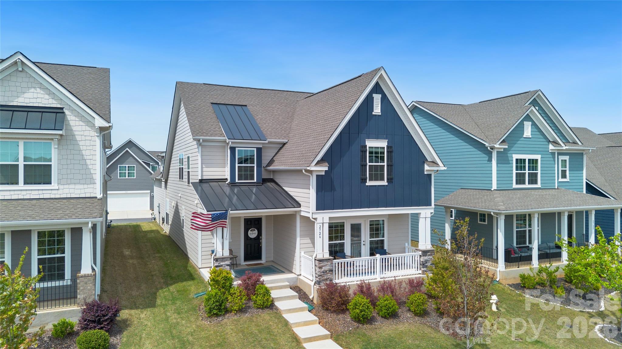 REDUCED! This home is sitting on the cutest street in the community! It's named Monument Point for a reason! The homes sit higher on the lots and give that "Wisteria Lane" vibe with cute cottage looking homes, front porches for sitting and extra wide street for guest parking. This home offers Primary Suite on main level with walk-out private owners porch - great for morning coffee or evening cocktails. It also offers a separate front porch great for entertaining. Only 2 years old this home has been well taken care of with many upgrades. Large laundry room with extra storage space, open kitchen to family room. Kitchen with upgraded appliances, double ovens, gas stove, quartz countertops and upgraded cabinets. Front staircase to 2 spacious bedrooms and loft for playroom or office. Backstair case to private bedroom/bonus with full bath. Perfect Junior Suite or back office. Cozy screen porch and side yard for activities. 2 car garage with back entry. State of the art - community center with fitness center, sport courts, pickleball courts, pool, club house and more...