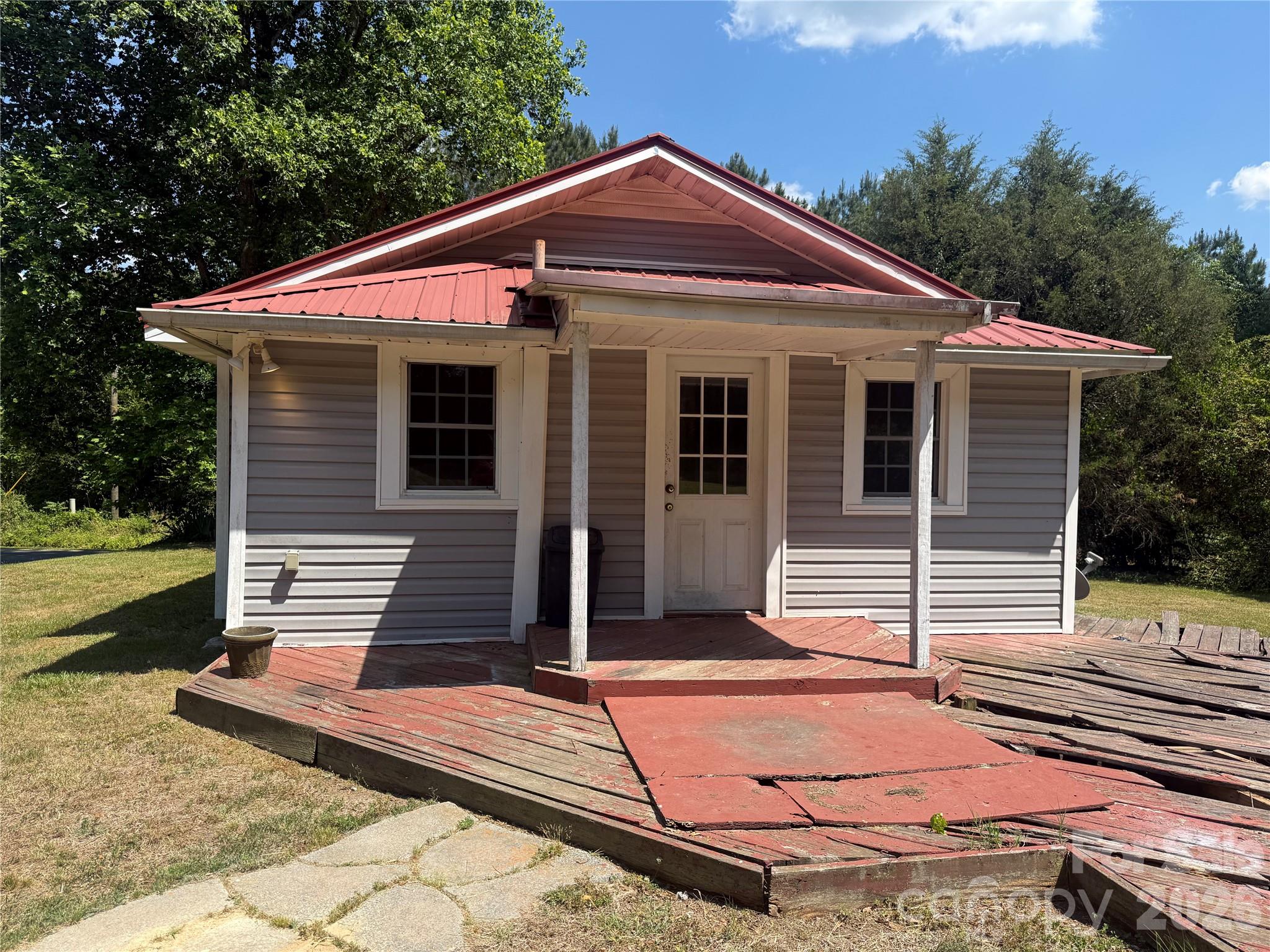 Great opportunity in Troy! This 2-bedroom, 1-bathroom home on Sunset Drive is great for investors or first-time home buyers looking to build equity or transition to a smaller home. Located on a dead end street you are just minutes from local schools, shopping, and dining. Storage building and dethatched carport included. Metal roof installed in 2013 as well as windows and HAVAC unit.