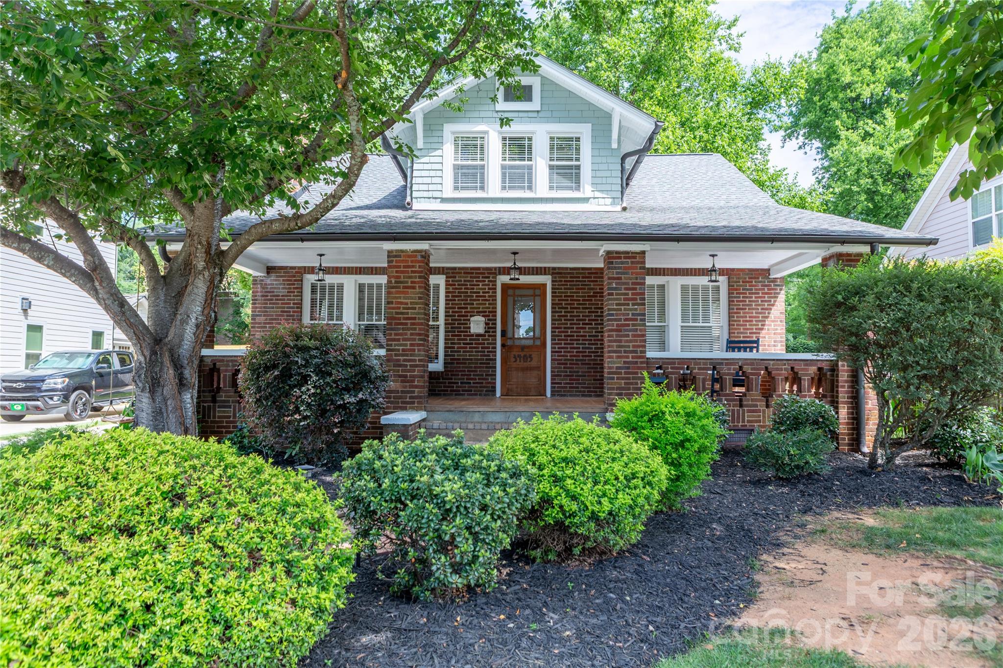 Welcome to 3405 Ritch Avenue, a beautifully maintained brick bungalow just steps from the heart of Charlotte's vibrant NoDa Arts District. Blending timeless character with modern living, this 3-bedroom, 2-bath home features soaring ceilings, abundant natural light, hardwood floors, and unique architectural details.
Leave the car at home and enjoy an unbeatable location just a short walk to Sprouts Farmers Market, Amelie's French Bakery & Café, neighborhood restaurants, breweries, and all that NoDa has to offer. The LYNX Blue Line station is only two blocks away, providing easy access to Uptown, UNC Charlotte, South End, and South Charlotte.

The well-maintained backyard offers a charming outdoor space with mature landscaping, a fire pit, and two storage sheds. Perfect for relaxing, entertaining, gardening, or pets.  

Rarely does a home offer this combination of historic character, walkability, outdoor space, and transit access in the heart of NoDa. Don't miss your opportunity to experience one of Charlotte's most vibrant neighborhoods.