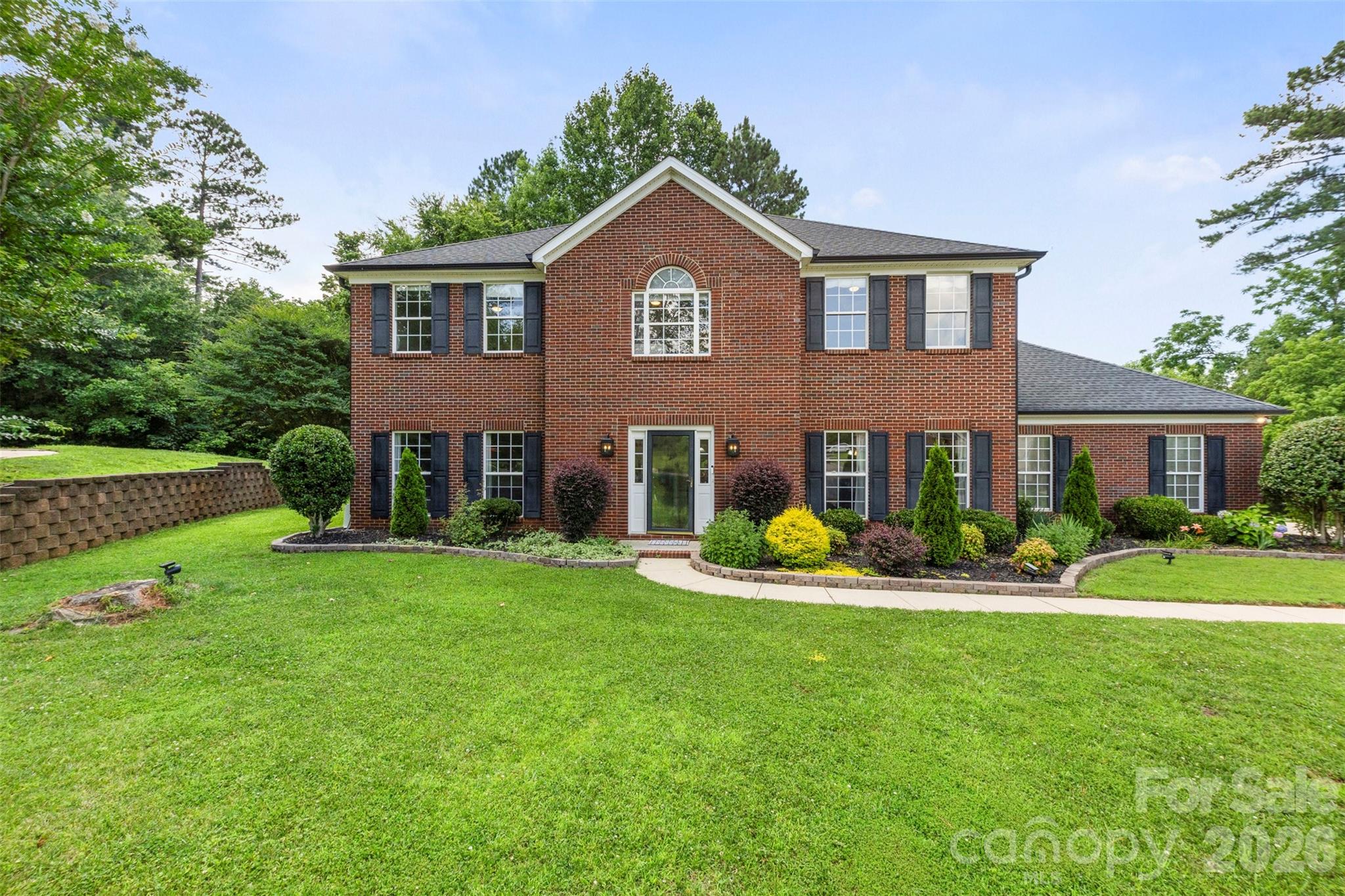 Beautiful full brick home located in the sought-after Orchard Park neighborhood. This well-maintained 4-bedroom, 2.5-bath home sits on a quiet cul-de-sac and features a spacious floor plan with formal living and dining rooms, a large family room with gas fireplace, and an enclosed sunroom overlooking the backyard. The updated kitchen offers granite countertops, stainless steel appliances, and a stylish tile backsplash. Upstairs, the primary suite includes a tray ceiling and walk-in closet. 3 additional bedrooms with a full bathroom PLUS a bonus room/office. Enjoy the outdoors with a private rear patio and in-ground irrigation. Community amenities include a pool, playground, and tennis courts. Hickory Ridge Schools! Convenient to shopping, dining, and major highways.