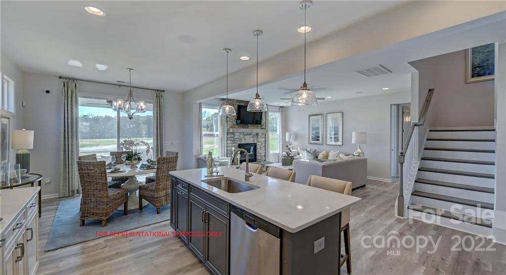 MLS #3931595 ~ REPRESENTATIVE PHOTOS ADDED. Summer Completion!  The Waverly is a captivating floor plan with a first floor guest suite and dining room,  spacious gathering room with fireplace and a bright open kitchen allowing plenty of entertaining power. The second floor owner’s suite connects to the spa bath with  dual vanities, tile shower and two large walk-in closets. A spacious loft makes for a great play space or media room while the three additional bedrooms offer plenty of private space for everyone. Structural options added include: Tray ceiling in owner's suite and dining room, fireplace, bedroom with full bath in lieu of flex, expansive owner's shower, shower at bath 4, covered outdoor living area, windows at owner's suite, loft, dining room, casual dining and bedroom 4.