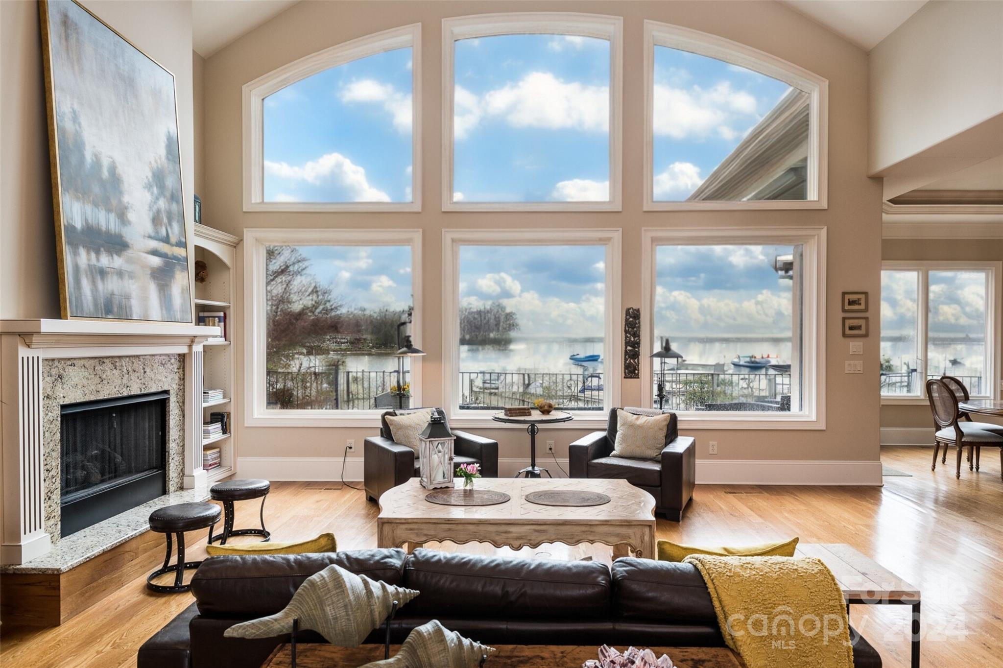 Welcome to 20417 Island Forest. Poised near the southern tip of Lake Norman, this waterfront home displays majestic views that will take your breath away. Open and inviting interior spotlights elegant living spaces and maximizes the stunning views. Imagine curling up with a good book on the expansive screened porch, soaking up the sun by the state-of-the-art pool, or hanging out on the outdoor terrace. This home is perfect for entertaining. Invite your family and friends over for a delightful evening of grilling by the outdoor fireplace. Enjoy fishing from the dock or take a leisurely boat ride on Lake Norman. Built in 2008, this home feels brand new, boasting an amazing floor plan that includes over 2800 square feet on the main level and an additional 1200 square feet on the lower level. If you're looking for the convenience of one-level living, this home is for you!