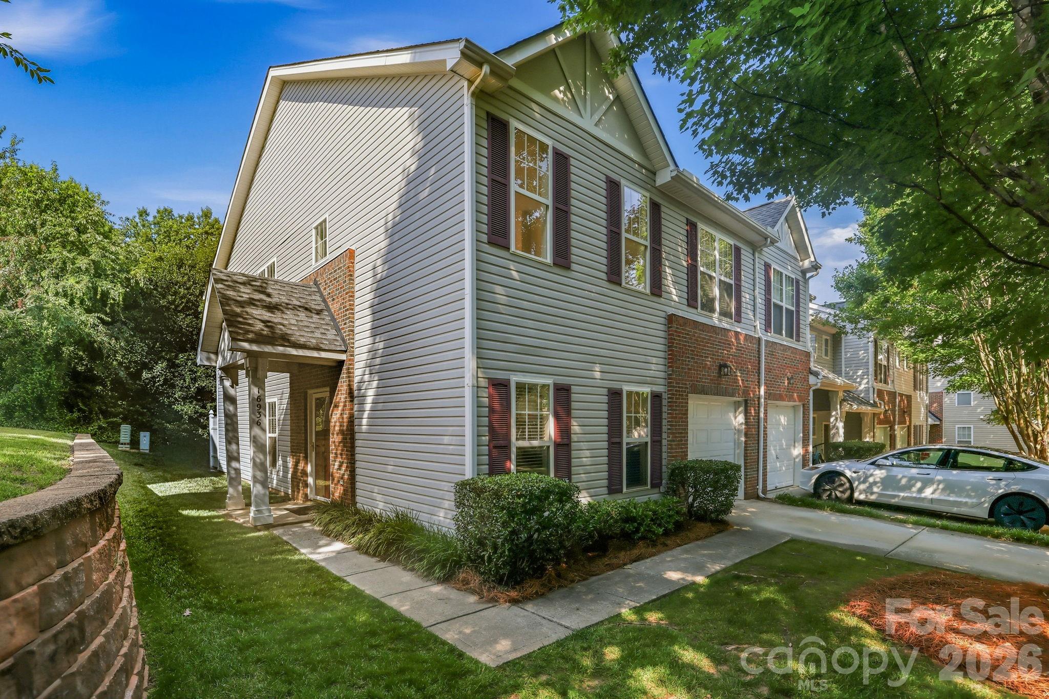Move-in ready end-unit townhome in sought-after Ballantyne offering an exceptional blend of comfort, quiet, and low-maintenance living. Freshly painted throughout, the main level provides an open floor plan highlighted by a stunning two-story dining area and living room with gas fireplace, enhanced by vaulted ceilings and abundant natural light. The updated kitchen includes newer appliances and features (2019-2025), as well as beautiful quartz countertops (2023). The primary bedroom is located on the main level with an en-suite featuring dual vanities. Upstairs features two spacious bedrooms, a full bath with separate access, and a walk-in laundry room. The home also has a single-car garage, as well as additional side parking for convenience. 

Set back in the neighborhood, the property offers a sense of privacy and quiet, along with community amenities like the outdoor pool. HOA dues include lawn maintenance, water and sewer services, and there is no rental cap, so the property presents a unique opportunity if you choose to explore investment opportunities. The potential is undeniable. All of this is complemented by a prime Ballantyne location, placing you just minutes from shopping, dining, parks, greenways, and everyday conveniences, with easy access to major roadways and the South Carolina border. Don’t miss this opportunity to own a charming home in one of the area’s most desirable communities.