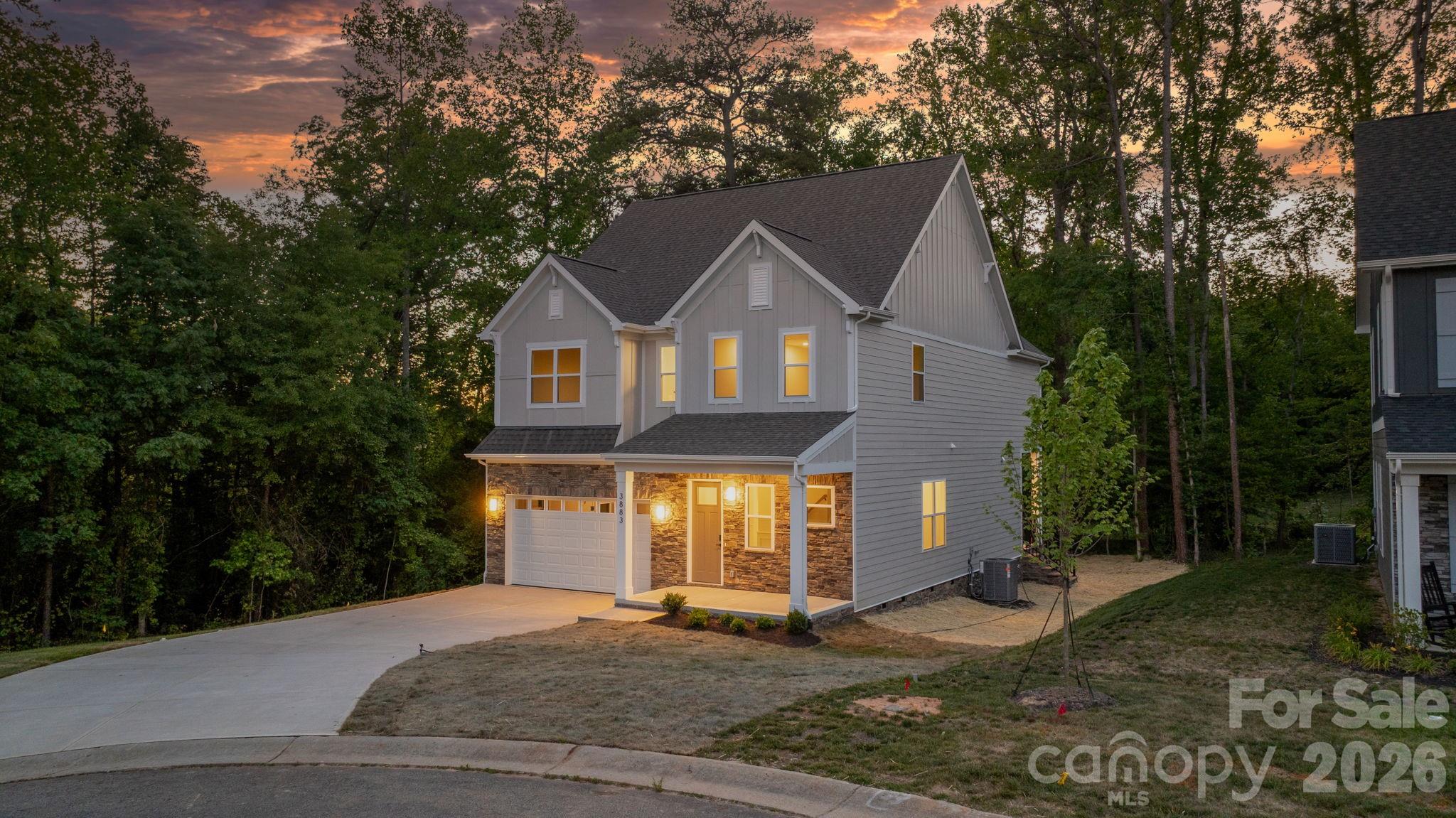 Stunning New Construction by Northway Homes | Over 3,000 Sq Ft in The Falls at Cloninger Mill | Hickory, NC
Welcome to this beautifully crafted 4-bedroom, 3.5-bathroom residence built by Northway Homes, offering over 3,000 square feet of modern luxury living in the established and sought-after community of The Falls at Cloninger Mill.
This home blends timeless design with thoughtful functionality at every turn. The spacious open-concept main level seamlessly connects the kitchen, living, and dining areas, ideal for both entertaining and everyday living. A convenient drop zone near the entry keeps shoes, bags, and everyday essentials organized, while a dedicated office on the first floor provides the perfect environment for remote work, homework, or a quiet retreat.
Upstairs, all four bedrooms are thoughtfully positioned for privacy and convenience, including a generous primary suite designed for comfort and relaxation. The oversized two-car garage offers ample space for vehicles and storage.
Location, Location, Location:
This home offers the best of Hickory living with close proximity to Downtown Hickory's thriving shops, restaurants, and entertainment. Lake Hickory is just minutes away, with the closest boating access only 15 minutes from your door perfect for weekend lake days, fishing, or sunset cruises.
Top-Rated Schools:
Located in the highly desirable Catawba County school district, serving Clyde Campbell Elementary and Arndt Middle School.
Enjoy the benefits of brand-new construction with the charm and convenience of an established neighborhood. Shopping, dining, parks, and everything Hickory has to offer are right at your fingertips.
This is modern living at its finest, schedule your private tour today!