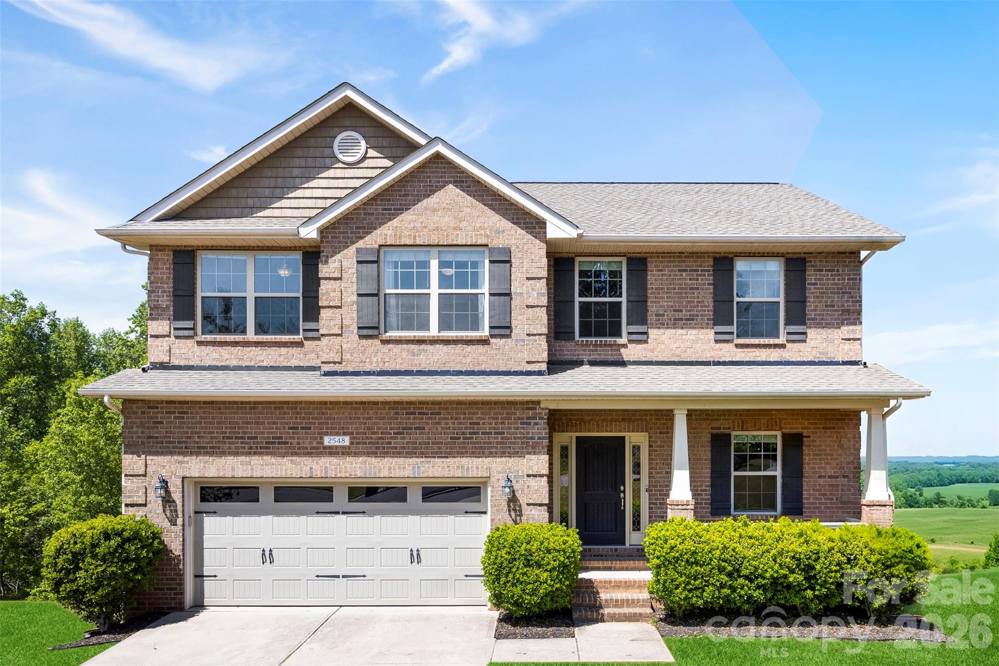 Welcome to the highly desired Kinmere Farms neighborhood.  This 3 level home features 5 bedrooms, 4 full bathrooms, and a finished walk out basement.  The main level has a walk out porch off of the kitchen/dining area that overlooks the trees beyond the back yard.  There is a bedroom and full bathroom on the main level, 3 bedrooms upstairs with new carpet, and a bedroom with a full bathroom in the basement.  The basement has an additional flex space along with 2 ample sized storage closets.  This home has no shortage of space for entertaining.  The back yard does have a slope going down to the trees.  The owner has installed a small fenced in area outside of the walk out basement.
