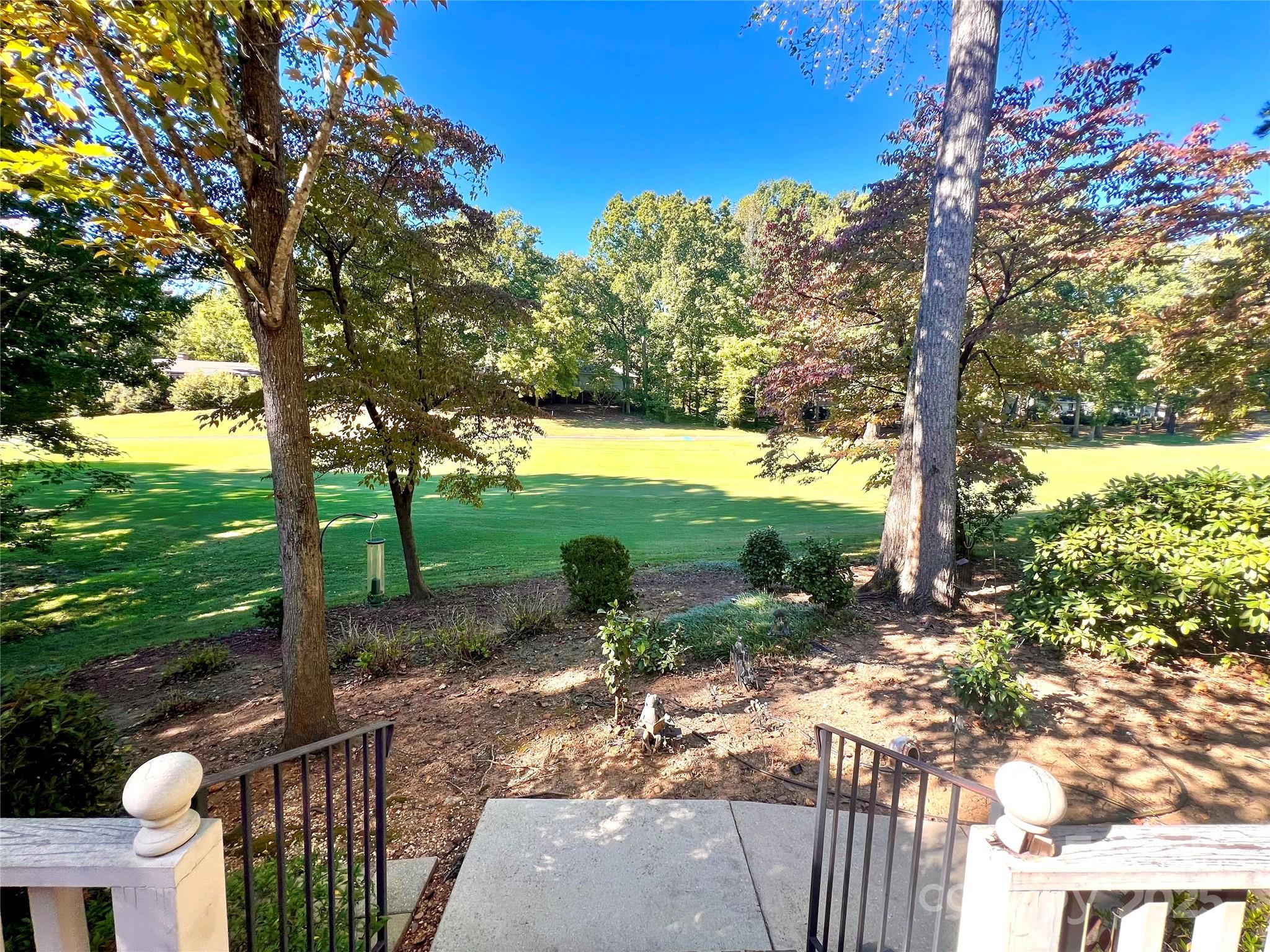 Discover an extraordinary opportunity to own one of the most unique and spacious homes in the prestigious, amenity-rich River Hills community. Perfectly situated on a peaceful cul-de-sac overlooking the golf course, this newer custom-built estate offers a rare blend of privacy, craftsmanship, and timeless luxury. Built in 2004 by a premier builder for his own personal residence, every inch of this home reflects superior quality and thoughtful design that truly sets it apart from the rest. The open-concept floorplan features expansive living and entertaining areas—ideal for both everyday living and hosting in style. A chef’s kitchen anchors the main level with high-end finishes and abundant workspace, opening seamlessly to a spacious family room, elegant formal dining area, and sophisticated home office library. The oversized primary suite overlooks the golf course with a large ensuite bathroom featuring dual vanities, soaking tub, walk in tile shower, and walk in closet. Retreat to the massive lower level, a true standout offering endless flexibility. With its own private entrance, large open room, separate flex room, full bath, closet space, and kitchenette, this space can easily function as a multigenerational suite, guest quarters, or recreational retreat—all while still providing ample storage and utility space. Car enthusiasts will fall in love with the two separate garages both with epoxy floors, accommodating up to six total vehicles, plus a large dedicated workshop area for projects or hobbies. Upstairs, a large bonus room/bedroom with full bath adds even more versatility to this already impressive layout. Enjoy the unmatched River Hills lifestyle—a secure, 24/7 gated lakefront community featuring golf, tennis, pickleball, walking trails, marina access, playgrounds, waterfront beaches and parks, and a true sense of community—all just minutes from Charlotte and with top-rated Clover schools. Homes of this size, quality, and design are a rare find in River Hills; make this one-of-a-kind estate your own! The house has been redistricted to the brand new Lake Wylie High School opening in 2026.