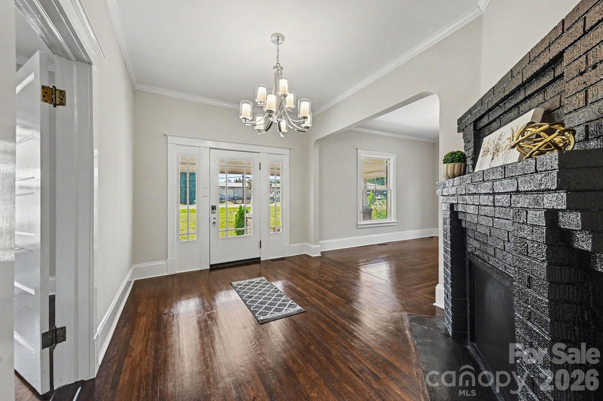 Step into timeless charm with this stunning 100-year-old, 5-bedroom, 2-bath home, where historic character meets modern convenience. From the moment you arrive, you'll appreciate the home's inviting curb appeal and the abundance of original architectural details that make it truly one of a kind.
Inside, you'll find beautiful original hardwood floors, soaring ceilings, tall baseboards, multiple fireplaces, an original cedar closet, a classic butler's door along with a butler's pantry, glass door knobs, built ins, stain glass  door, and countless charming features that showcase the craftsmanship of a bygone era. Thoughtfully updated bathrooms and a modernized kitchen provide today's comforts while preserving the home's nostalgic appeal.
Relax on the spacious covered front porch or entertain family and friends on the large newly added deck, offering plenty of outdoor living space.
Adding to its versatility, this property is zoned for commercial use, making it an excellent opportunity for a business in a high-visibility location along Main Street/Highway 29. Whether you're searching for a distinctive residence, a business location, or both, the possibilities are endless. Additional land is also available for purchase if desired.
Recent updates include a new water heater installed in 2025.
Conveniently located just minutes from I-85, shopping, restaurants, and everyday amenities, this home offers the best of small-town living in the charming community of China Grove, with easy access to Mooresville, Charlotte, Kannapolis, and Salisbury.
Don't miss this rare opportunity to own a piece of history with endless potential!
