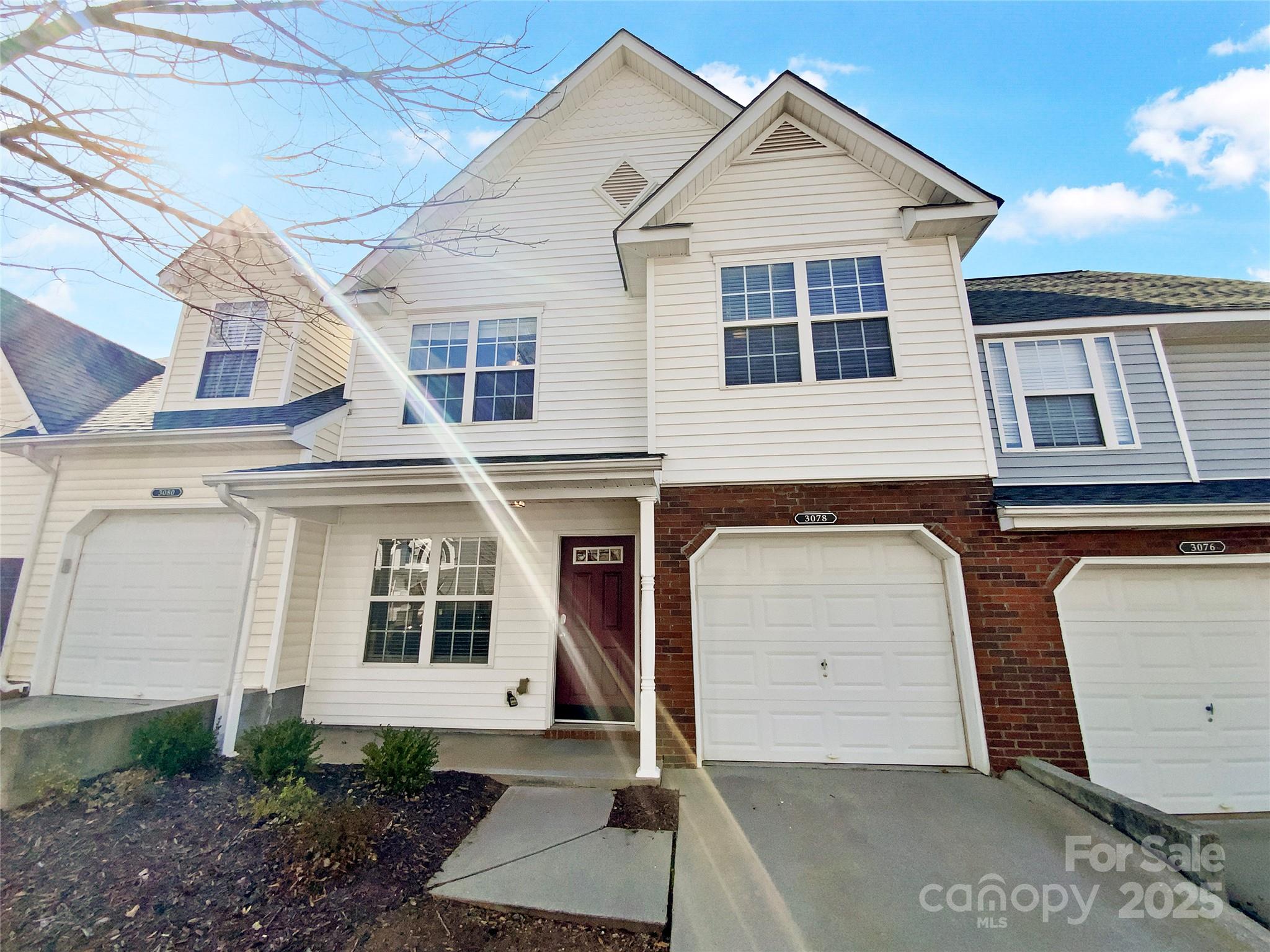 Seller may consider buyer concessions if made in an offer. Welcome to this charming property featuring a cozy fireplace, creating a warm and inviting atmosphere. The natural color palette throughout the home adds to the tranquil ambience, while the kitchen boasts a nice backsplash for added style. The primary bathroom offers double sinks for convenience and good under sink storage for organization. Don't miss out on the opportunity to make this house your home!