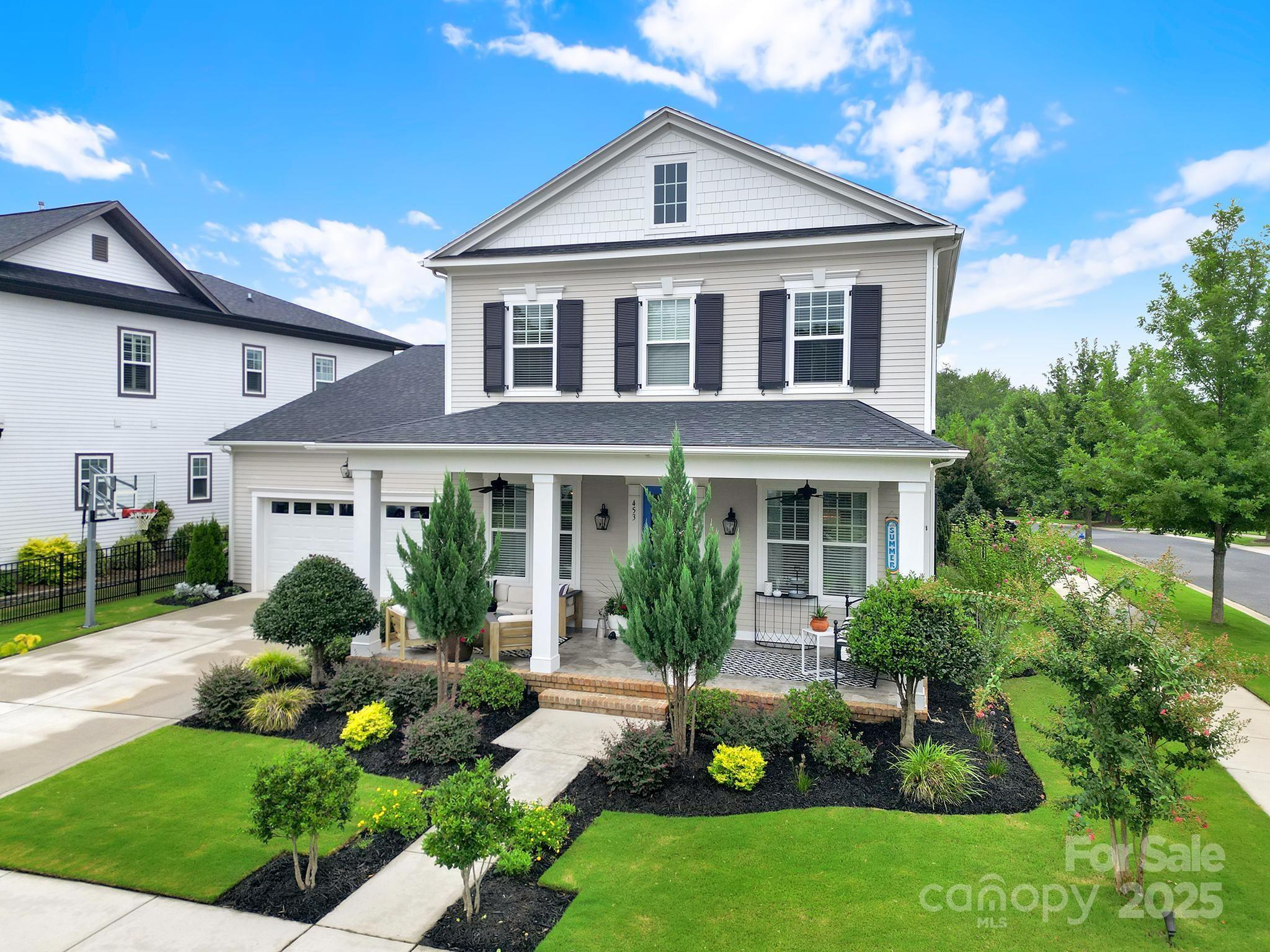 Welcome to this beautiful home in a sought-after community, with luxury style finishes. This community offers river access and resort-style amenities for an exceptional living experience. The main level features a open floorplan with plenty of natural light, butlers pantry with a beverage fridge making it perfect for entertaining. The stunning kitchen boasts quartz countertops, a counter-to-ceiling tile backsplash, and upgraded interior lighting throughout. The primary suite on the main level provides the ultimate retreat, complete with a spa-like bathroom and two primary closets. Located next to the laundry room on the main adds to the ease of living. Up the tread stairs you'll find a second primary suite,  spacious secondary bedrooms, loft, and walk in unfinished storage. Enjoy outdoor living with a tiled front porch and screened back back porch, perfect for relaxing. This home is also convenient to a community's common area. Located in an area with access to I77.